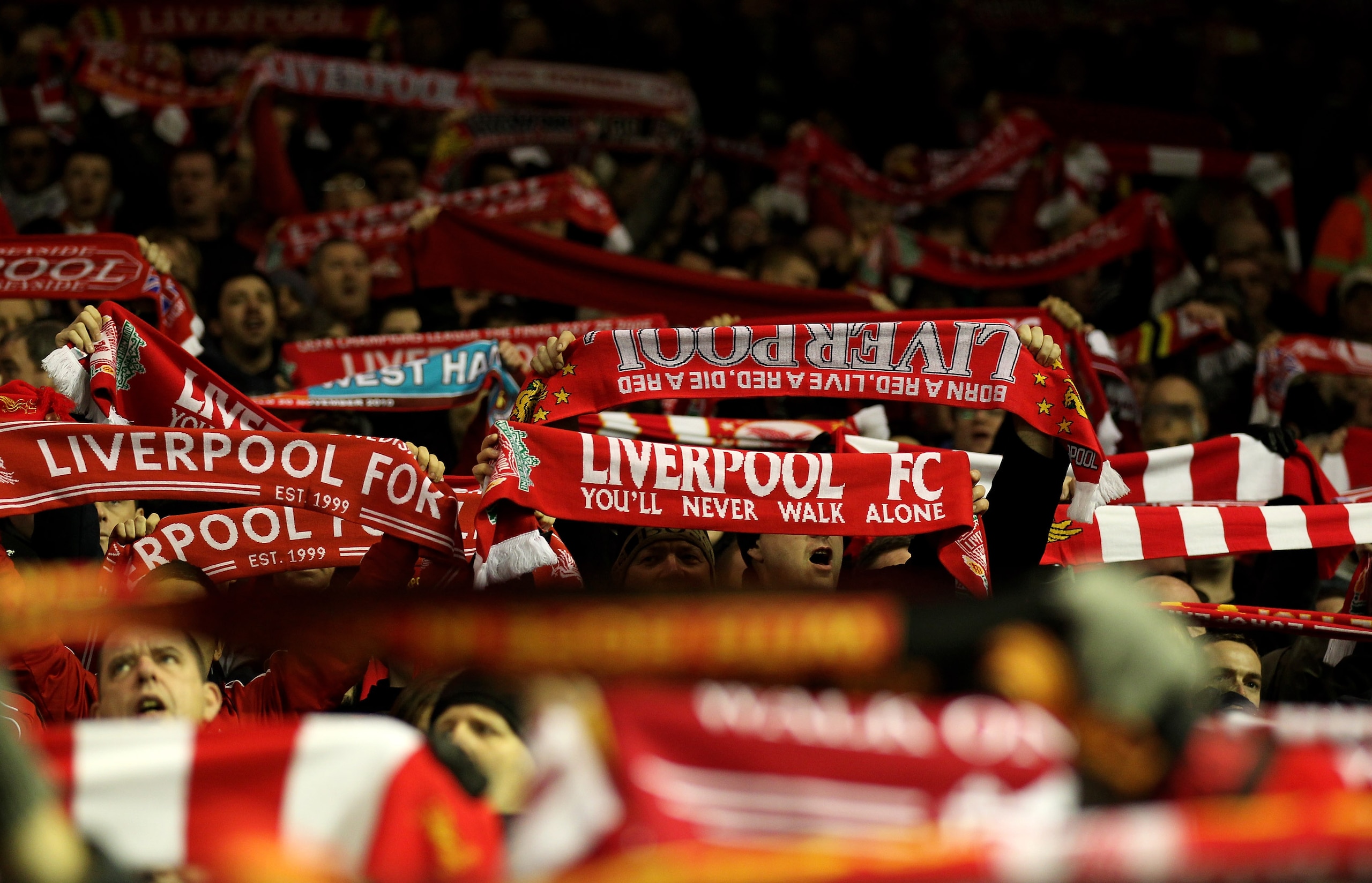 LIVERPOOL, ENGLAND - NOVEMBER 20:  Liverpool fans show their support on the Kop prior to the Barclays Premier League match between Liverpool and West Ham United at Anfield on November 20, 2010 in Liverpool, England.  (Photo by Alex Livesey/Getty Images)