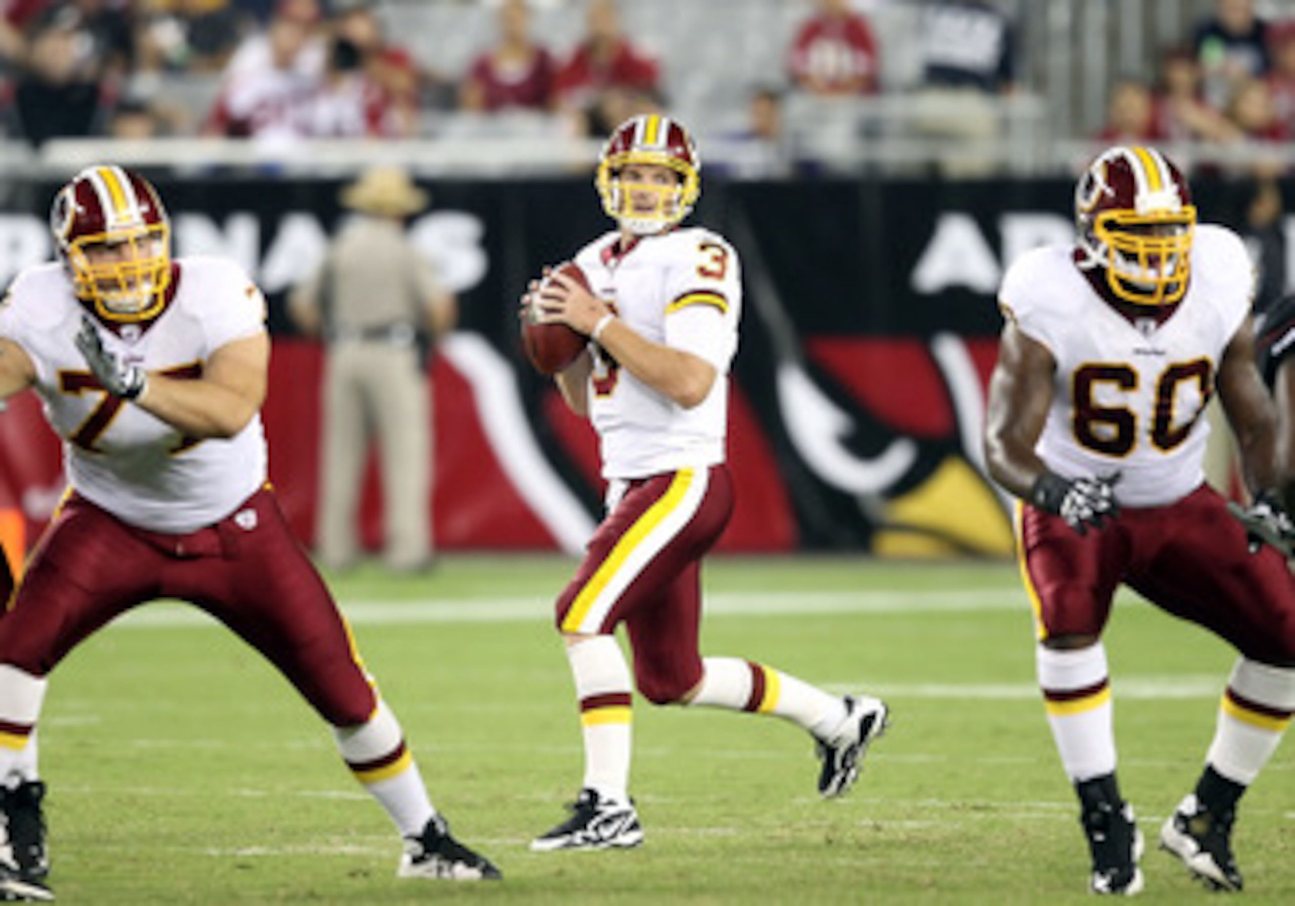 GLENDALE, AZ - SEPTEMBER 02:  Quarterback John Beck #3 of the Washington Redskins drops back to pass during the first quarter of the preseason NFL game against the Arizona Cardinals at the University of Phoenix Stadium on September 2, 2010 in Glendale, Ar