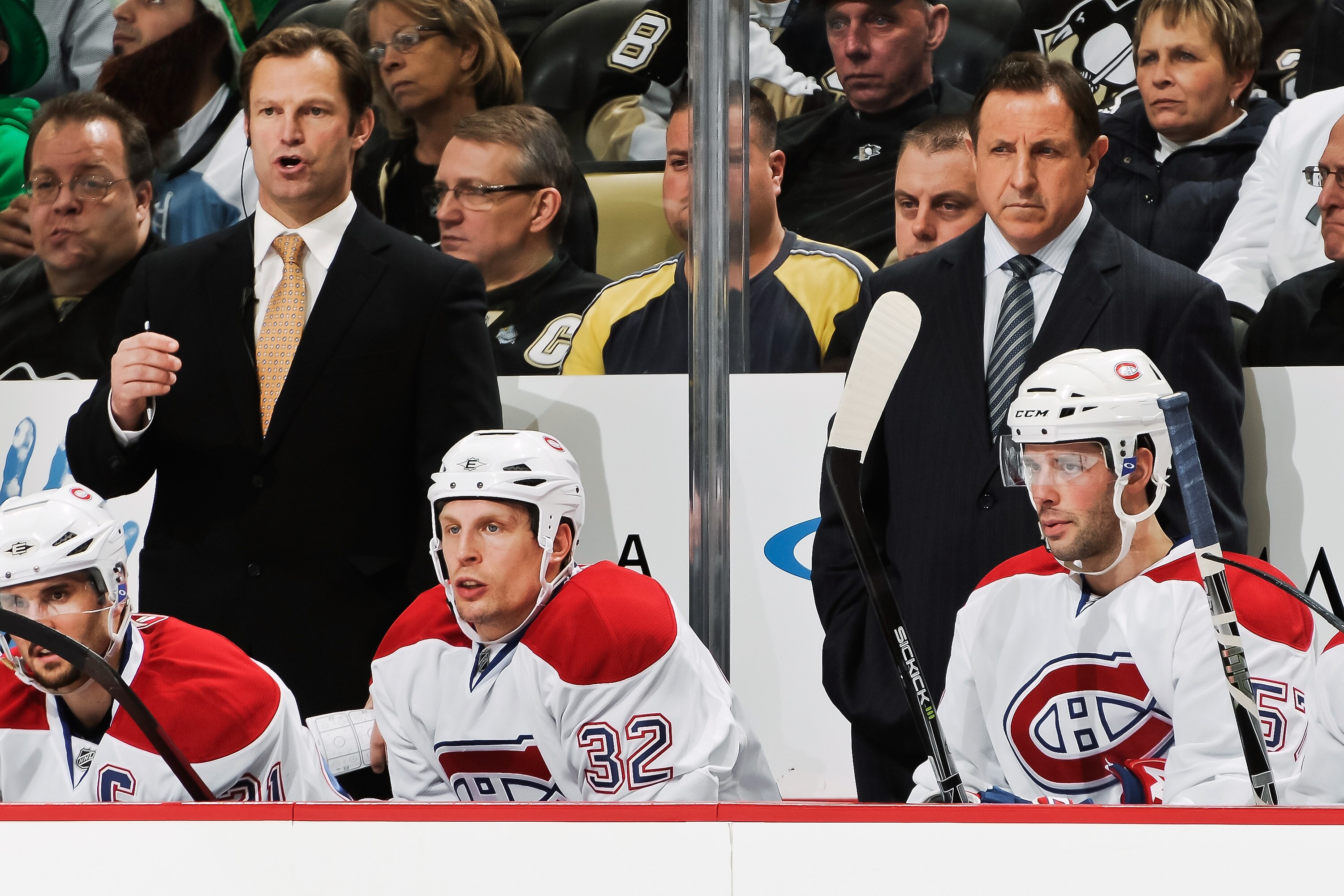 PITTSBURGH, PA - MARCH 12:  Assistant Coach Kirk Muller of the Montreal Canadiens and Head Coach Jacques Martin of the Montreal Canadiens watch their team play the Pittsburgh Penguins on March 12, 2011 at CONSOL Energy Center in Pittsburgh, Pennsylvania.