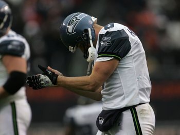 CHICAGO - JANUARY 14: Matt Hasselbeck #8 of the Seattle Seahawks reacts after throwing an interception against the Chicago Bears during their NFC Divisional Playoff game on January 14, 2007 at Soldier Field in Chicago, Illinois. The Bears defeated the Sea