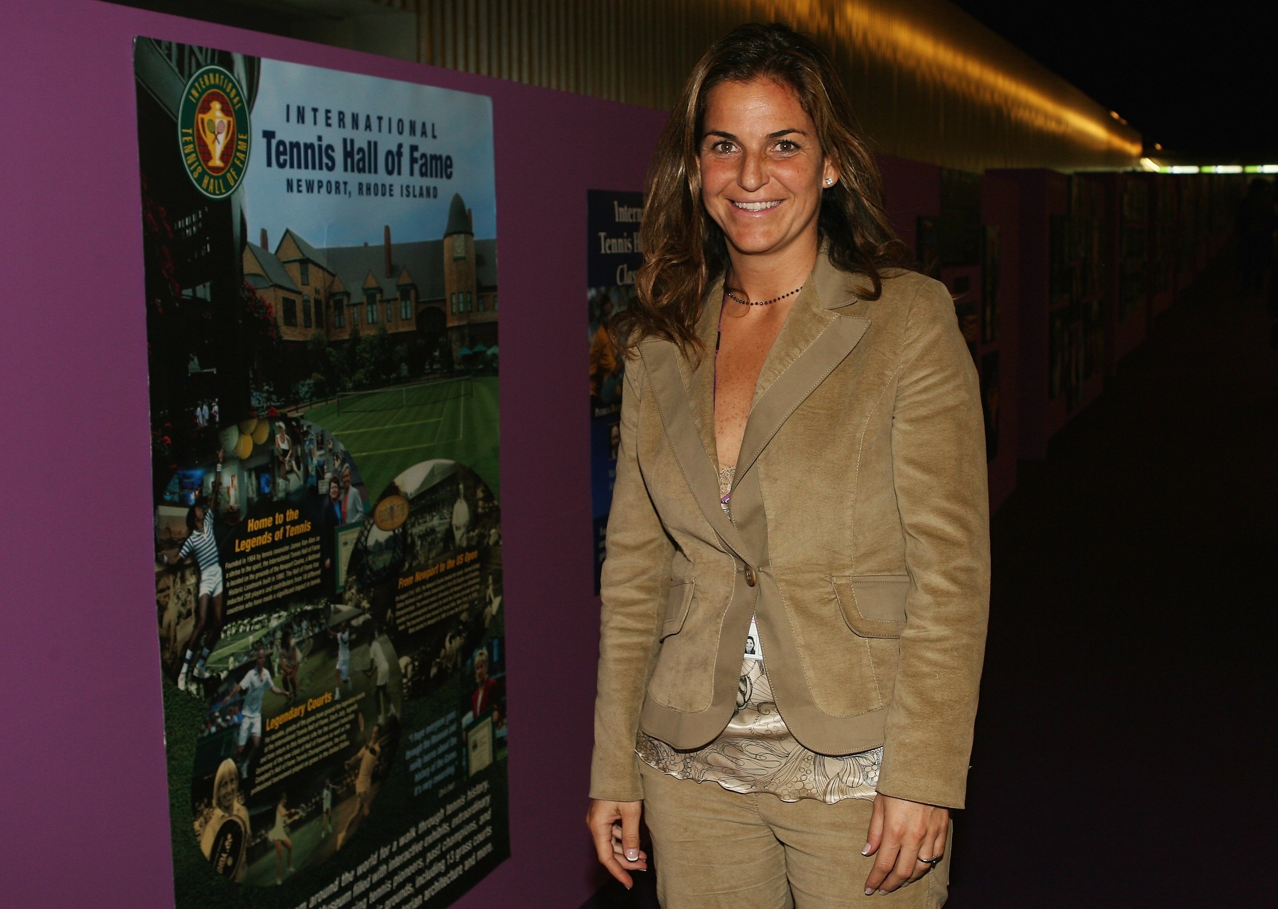 MADRID, SPAIN - NOVEMBER 07: Arantxa Sanchez-Vicario poses next to an International Tennis Hall of Fame poster during day one of the Sony Ericsson WTA Tour Championships at the Madrid Arena on November 7, 2006 in Madrid, Spain.  (Photo by Clive Brunskill/