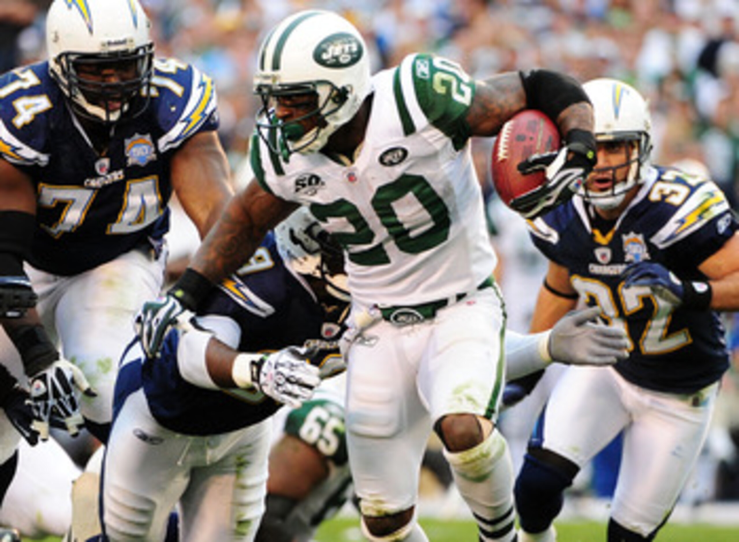 SAN DIEGO - JANUARY 17:  Running back Thomas Jones #23 of the New York Jets runs with the ball against the San Diego Chargers during the AFC Divisional Playoff Game at Qualcomm Stadium on January 17, 2010 in San Diego, California.  (Photo by Robert Laberg