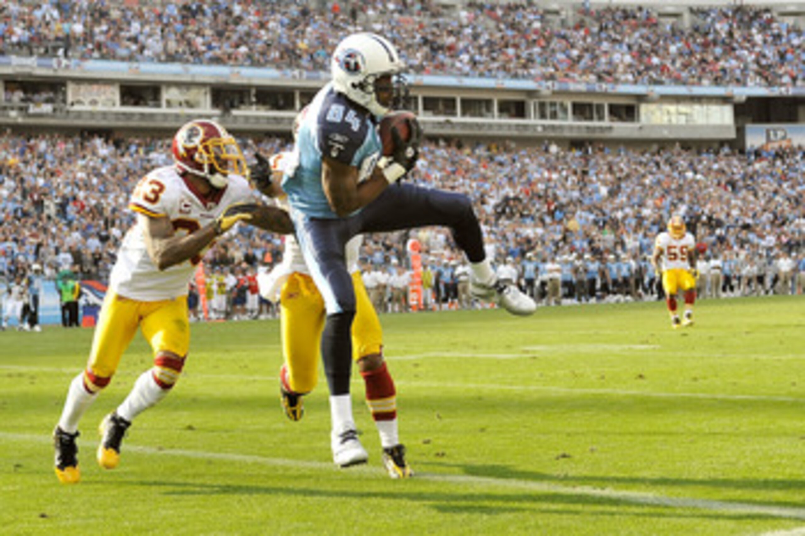NASHVILLE, TN - NOVEMBER 21:  Randy Moss #84 of the Tennessee Titans has a touchdown pass called back for offensive pass interference against the Washington Redskins at LP Field on November 21, 2010 in Nashville, Tennessee. The Redskins won 19-16 in overt