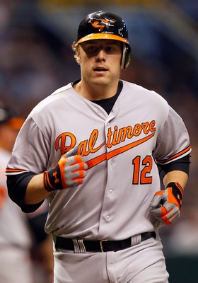 ST. PETERSBURG, FL - MAY 14:  Infielder Mark Reynolds #12 of the Baltimore Orioles rounds the bases after his home run against the Tampa Bay Rays during the game at Tropicana Field on May 14, 2011 in St. Petersburg, Florida.  (Photo by J. Meric/Getty Imag
