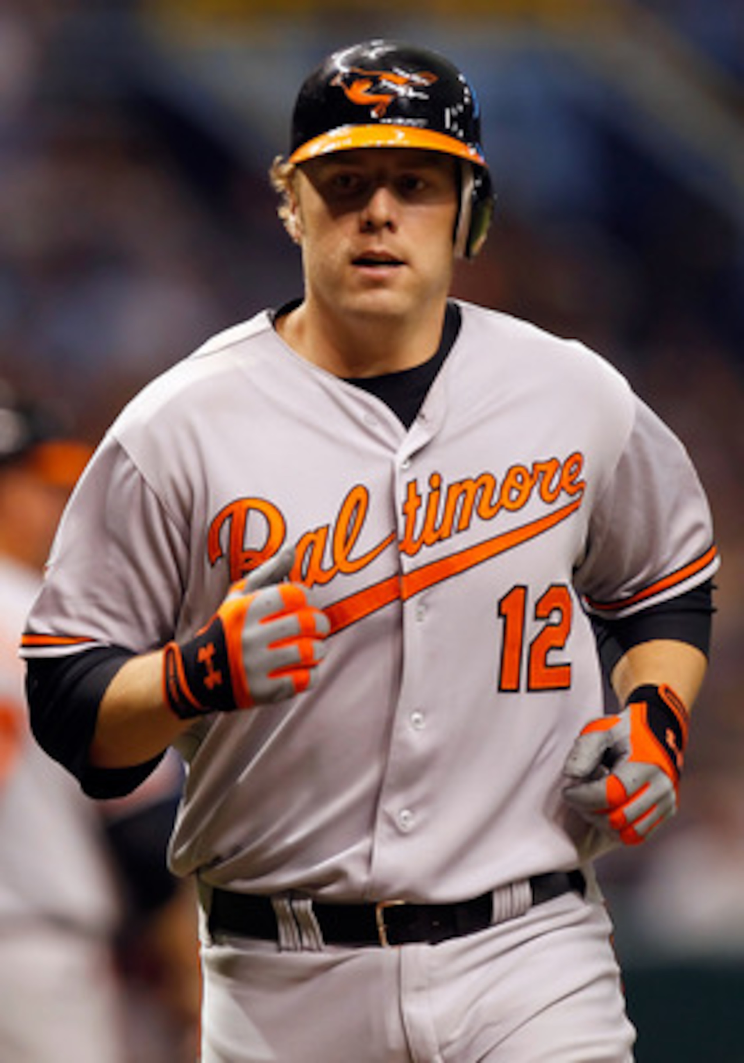 ST. PETERSBURG, FL - MAY 14:  Infielder Mark Reynolds #12 of the Baltimore Orioles rounds the bases after his home run against the Tampa Bay Rays during the game at Tropicana Field on May 14, 2011 in St. Petersburg, Florida.  (Photo by J. Meric/Getty Imag