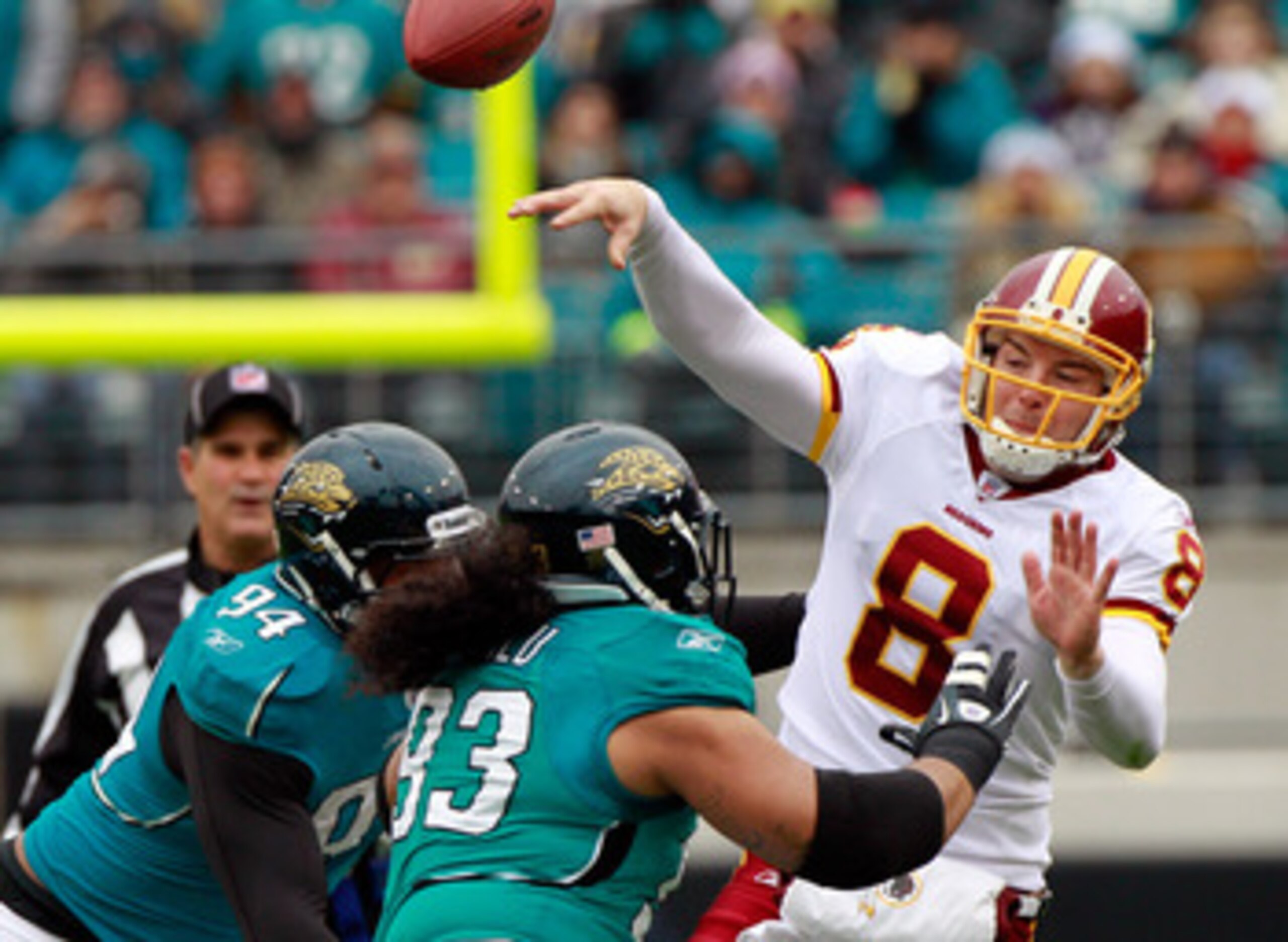 JACKSONVILLE, FL - DECEMBER 26: Quarterback Rex Grossman #8 of the Washington Redskins is pressured by Tyson Alualu #93 and Jeremy Mincey #94 of the Jacksonville Jaguars during the game at EverBank Field on December 26, 2010 in Jacksonville, Florida. (Ph JACKSONVILLE, FL - DECEMBER 26: Quarterback Rex Grossman #8 of the Washington Redskins is pressured by Tyson Alualu #93 and Jeremy Mincey #94 of the Jacksonville Jaguars during the game at EverBank Field on December 26, 2010 in Jacksonville, Florida. (Ph