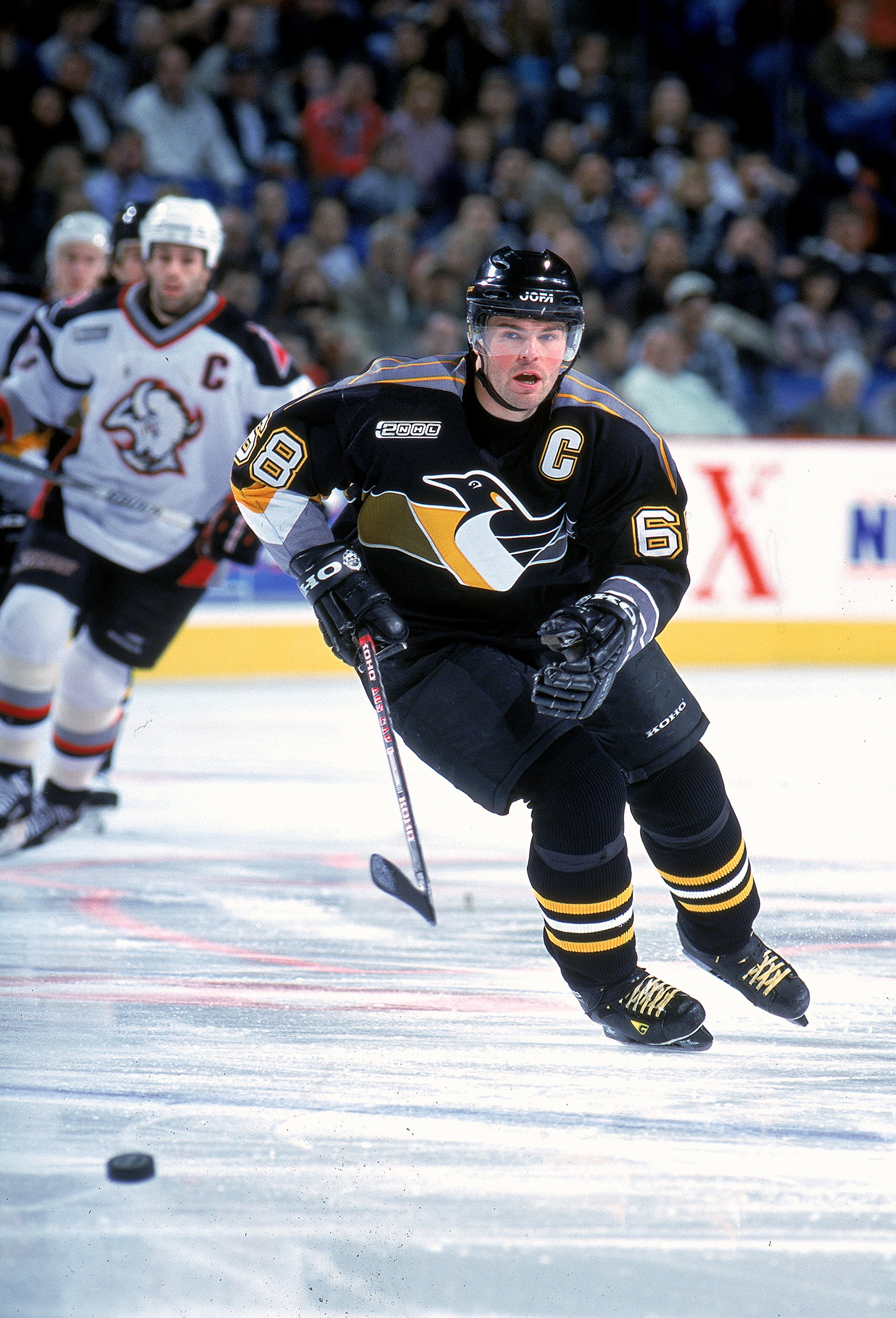 30 Nov 1999: Jaromir Jagr #68 of the Pittsburgh Penguins skates after the puck during the game against the Buffalo Sabres at the Marine Midland Arena in Buffalo, New York. The Penguins defeated the Sabres 4-1. Mandatory Credit: Rick Stewart  /Allsport