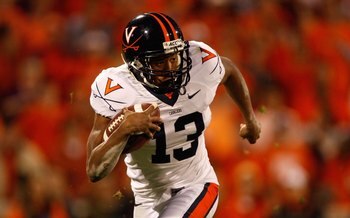 CLEMSON, SC - NOVEMBER 21:  Chase Minnifield #13 of the Virginia Cavaliers runs with the ball during the game against the Clemson Tigers at Memorial Stadium on November 21, 2009 in Clemson, South Carolina.  (Photo by Streeter Lecka/Getty Images)