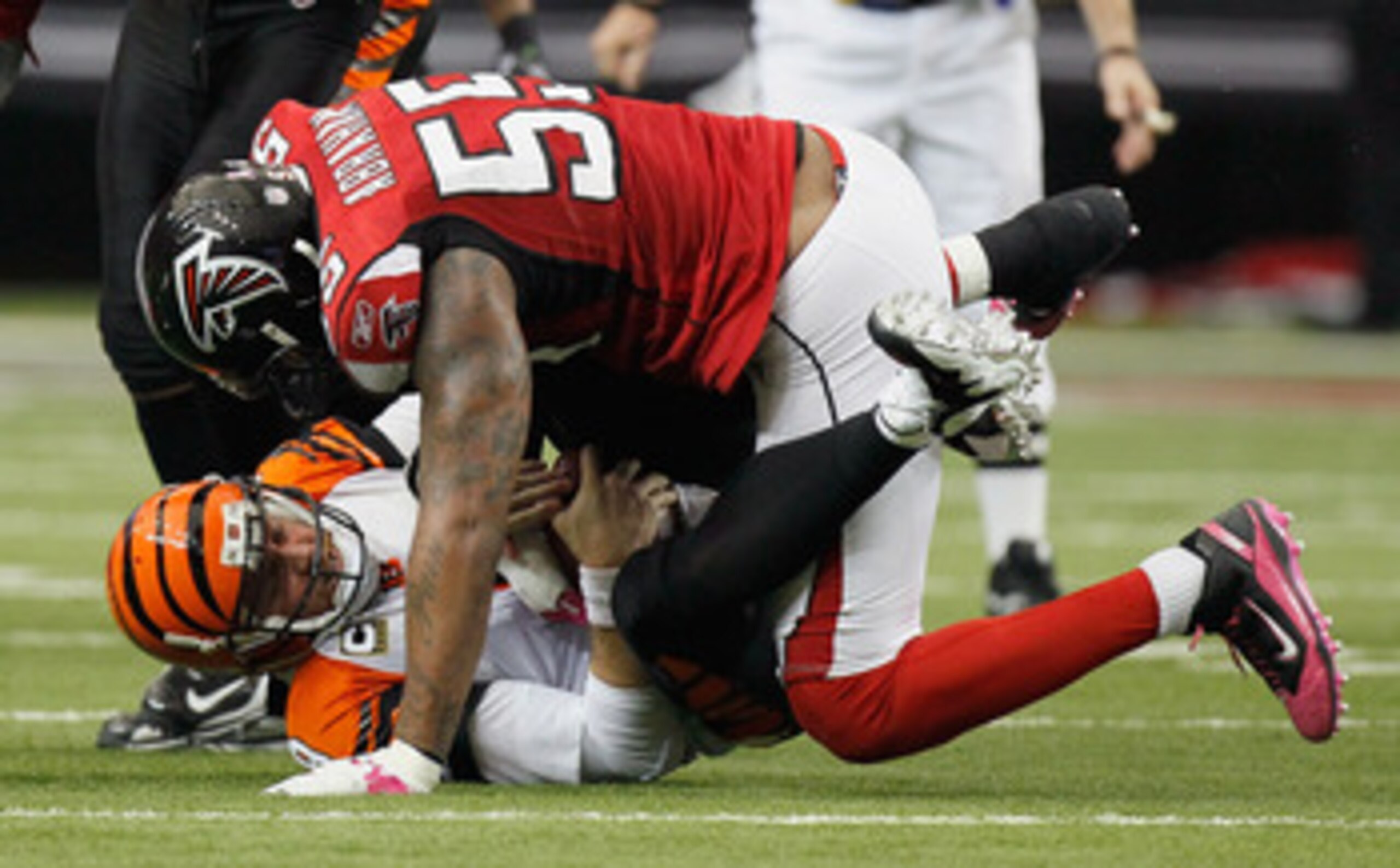 ATLANTA - OCTOBER 24: Quarterback Carson Palmer #9 of the Cincinnati Bengals is sacked by John Abraham #55 of the Atlanta Falcons at Georgia Dome on October 24, 2010 in Atlanta, Georgia. (Photo by Kevin C. Cox/Getty Images) ATLANTA - OCTOBER 24: Quarterback Carson Palmer #9 of the Cincinnati Bengals is sacked by John Abraham #55 of the Atlanta Falcons at Georgia Dome on October 24, 2010 in Atlanta, Georgia. (Photo by Kevin C. Cox/Getty Images)