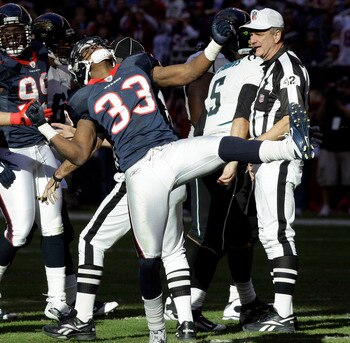 HOUSTON - JANUARY 02:  Troy Nolan #33 of the Houston Texans celebrates after sacking quarterbacl Trent Edwards #5 of the Jacksonville Jaguars at Reliant Stadium on January 2, 2011 in Houston, Texas.  (Photo by Bob Levey/Getty Images)
