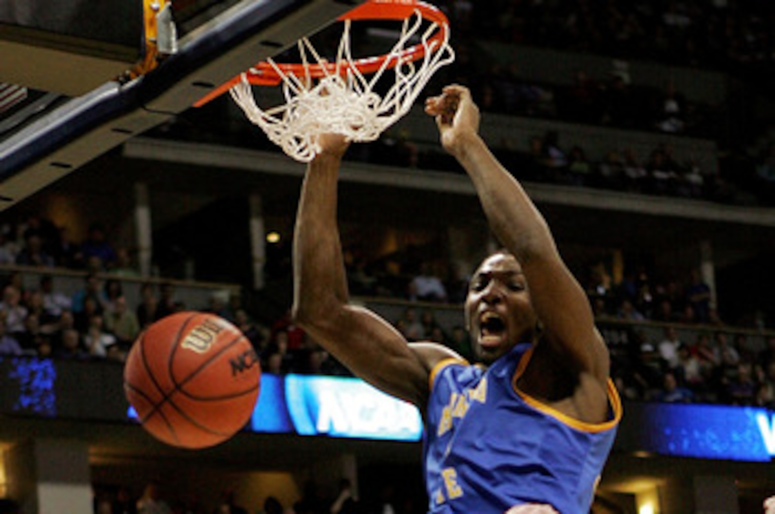 DENVER, CO - MARCH 19:  Kenneth Faried #35 of the Morehead State Eagles dunks the ball against the Richmond Spiders during the third round of the 2011 NCAA men's basketball tournament at Pepsi Center on March 19, 2011 in Denver, Colorado.  (Photo by Justi