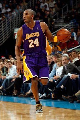 NEW ORLEANS - DECEMBER 23: Kobe Bryant #24 of the Los Angeles Lakers dribbles against the New Orleans Hornets on December 23, 2008 at the New Orleans Arena in New Orleans, Louisiana. NOTE TO USER: User expressly acknowledges and agrees that, by download NEW ORLEANS - DECEMBER 23: Kobe Bryant #24 of the Los Angeles Lakers dribbles against the New Orleans Hornets on December 23, 2008 at the New Orleans Arena in New Orleans, Louisiana. NOTE TO USER: User expressly acknowledges and agrees that, by download