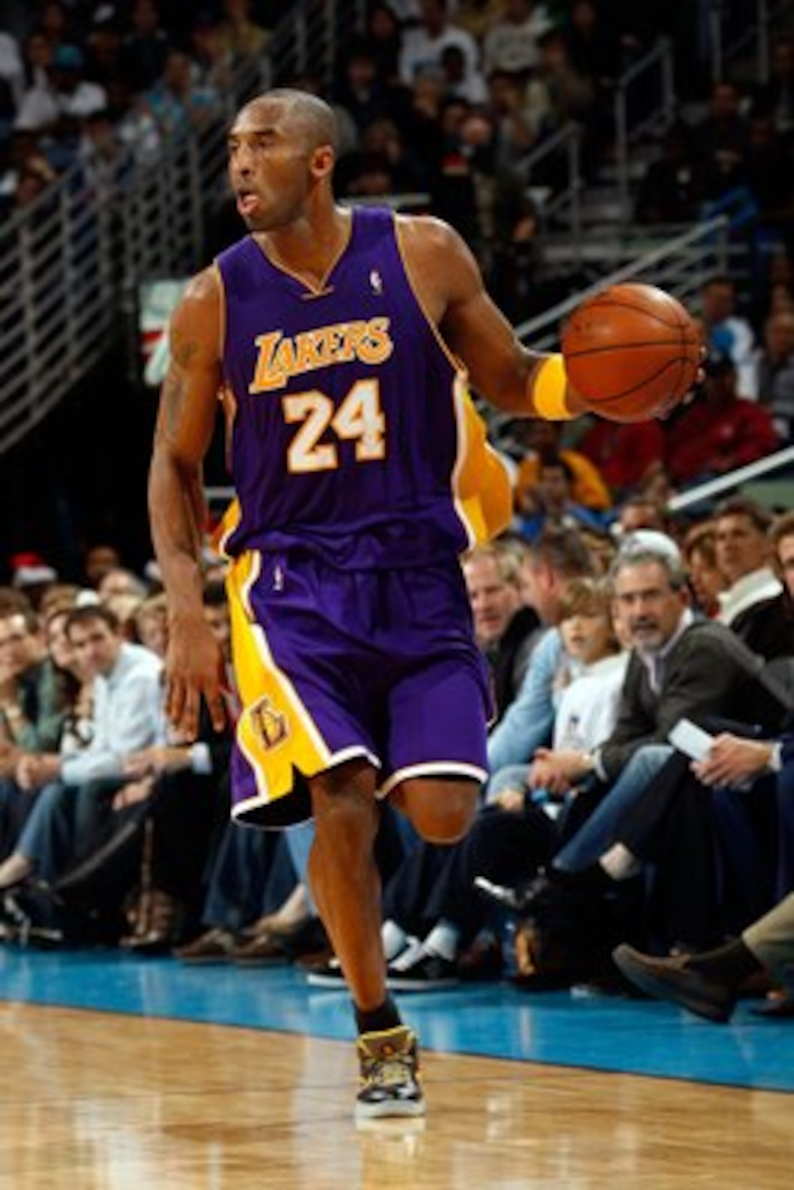 NEW ORLEANS - DECEMBER 23:  Kobe Bryant #24 of the Los Angeles Lakers dribbles against the New Orleans Hornets on December 23, 2008 at the New Orleans Arena in New Orleans, Louisiana.  NOTE TO USER: User expressly acknowledges and agrees that, by download