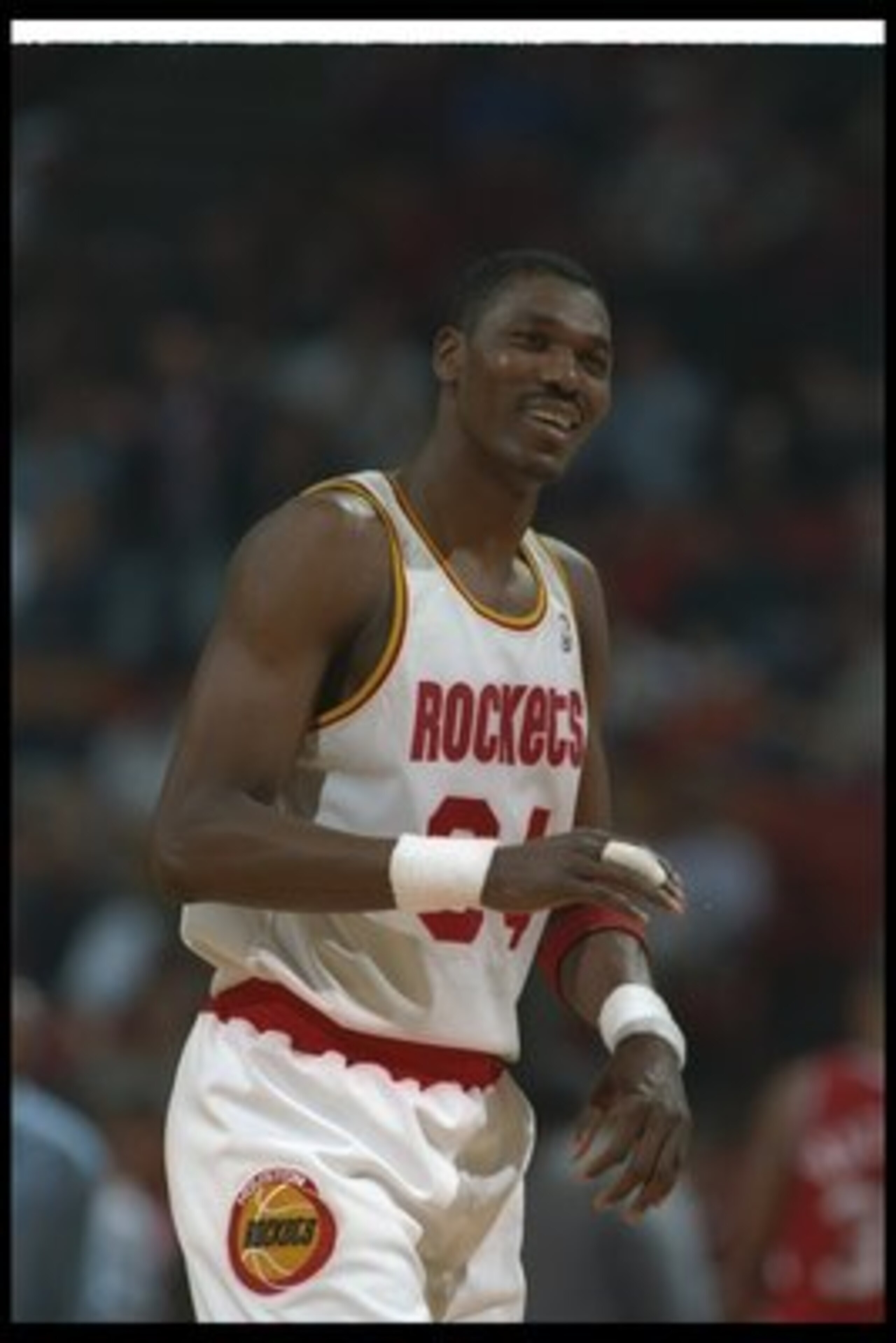 14 Jun 1995:  Center Hakeen Olajuwon of the Houston Rockets celebrates during a Finals game against the Orlando Magic at The Summit in Houston, Texas.  The Rockets won the game, 113-101. Mandatory Credit: ALLSPORT USA  /Allsport Mandatory Credit: ALLSPORT