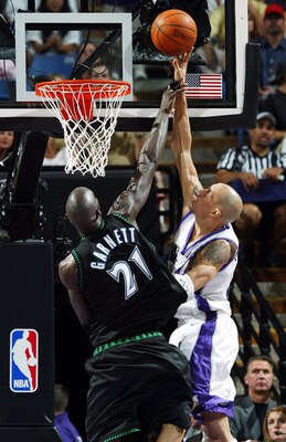 SACRAMENTO, CA - MAY 16: Kevin Garnett #21 of the Minnesota Timberwolves defends against Doug Christie #13 of the Sacramento Kings during Game six of the Western Conference Semifinals of the 2004 NBA Playoffs at Arco Arena on May 16, 2004 in Sacramento, SACRAMENTO, CA - MAY 16: Kevin Garnett #21 of the Minnesota Timberwolves defends against Doug Christie #13 of the Sacramento Kings during Game six of the Western Conference Semifinals of the 2004 NBA Playoffs at Arco Arena on May 16, 2004 in Sacramento,