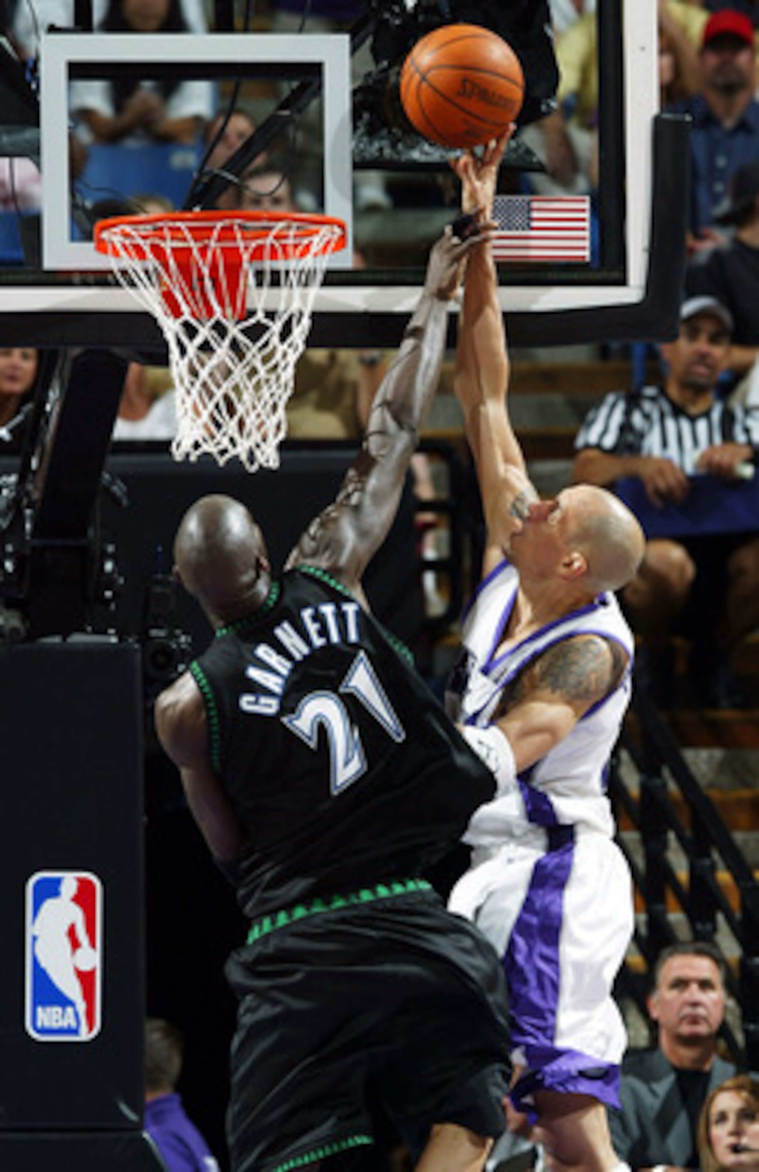 SACRAMENTO, CA - MAY 16:  Kevin Garnett #21 of the Minnesota Timberwolves defends against Doug Christie #13 of the Sacramento Kings during Game six of the Western Conference Semifinals of the 2004 NBA Playoffs at Arco Arena on May 16, 2004 in Sacramento,