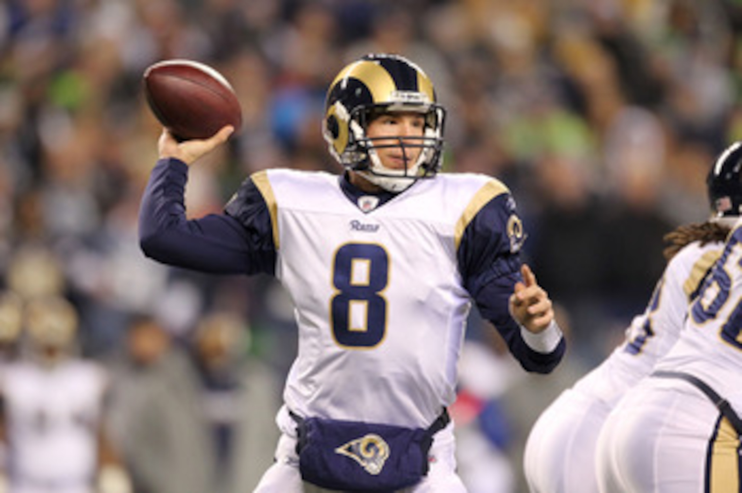 SEATTLE, WA - JANUARY 02: Quarterback Sam Bradford #8 of the St. Louis Rams looks to pass against the Seattle Seahawks during their game at Qwest Field on January 2, 2011 in Seattle, Washington. (Photo by Otto Greule Jr/Getty Images) SEATTLE, WA - JANUARY 02: Quarterback Sam Bradford #8 of the St. Louis Rams looks to pass against the Seattle Seahawks during their game at Qwest Field on January 2, 2011 in Seattle, Washington. (Photo by Otto Greule Jr/Getty Images)