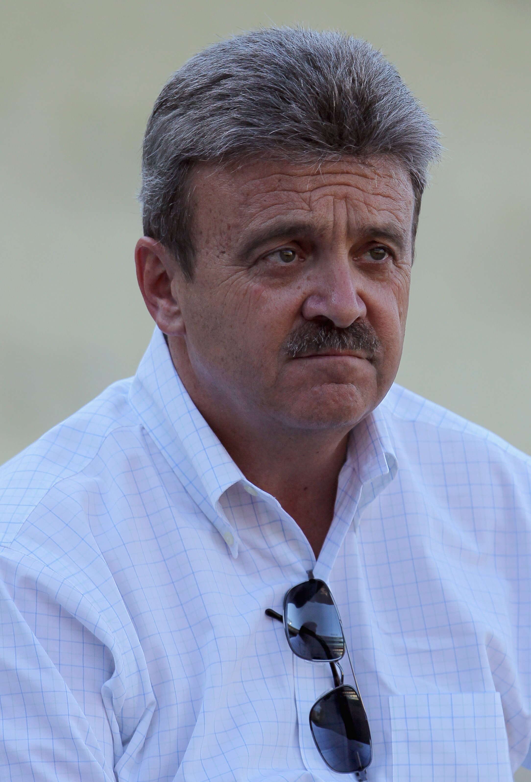 LOS ANGELES, CA - APRIL 16:  Los Angeles Dodgers general manager Ned Colletti looks on prior to the start of the game against the St Louis Cardinals at Dodger Stadium on April 16, 2011 in Los Angeles, California.  (Photo by Jeff Gross/Getty Images)