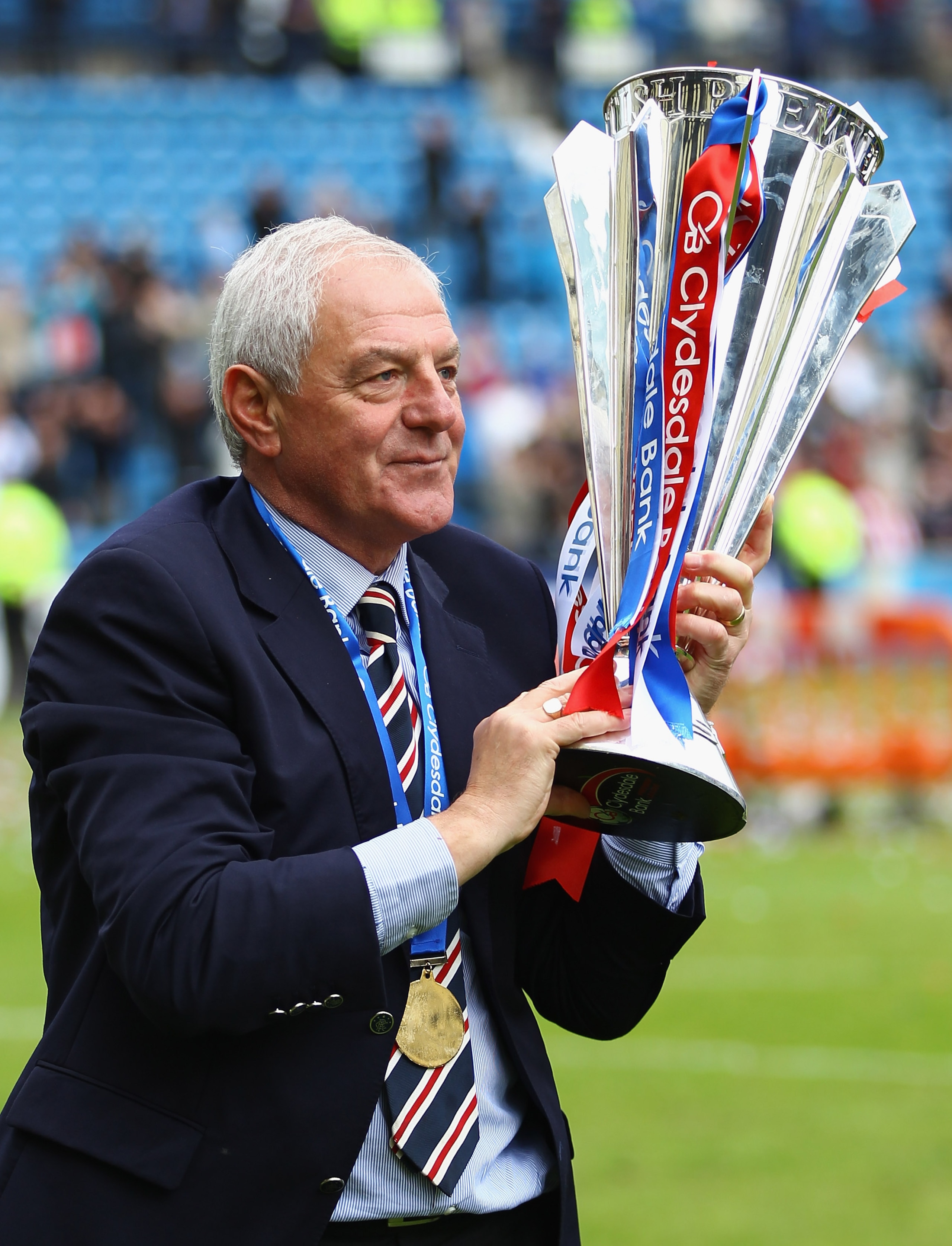 KILMARNOCK, SCOTLAND - MAY 15:  Walter Smith, manager of Rangers holds the Scottish Premier League trophy after winning the Clydesdale Bank Premier League at Rugby Park on May 15, 2011 in Kilmarnock, Scotland..  (Photo by Jeff J Mitchell/Getty Images)