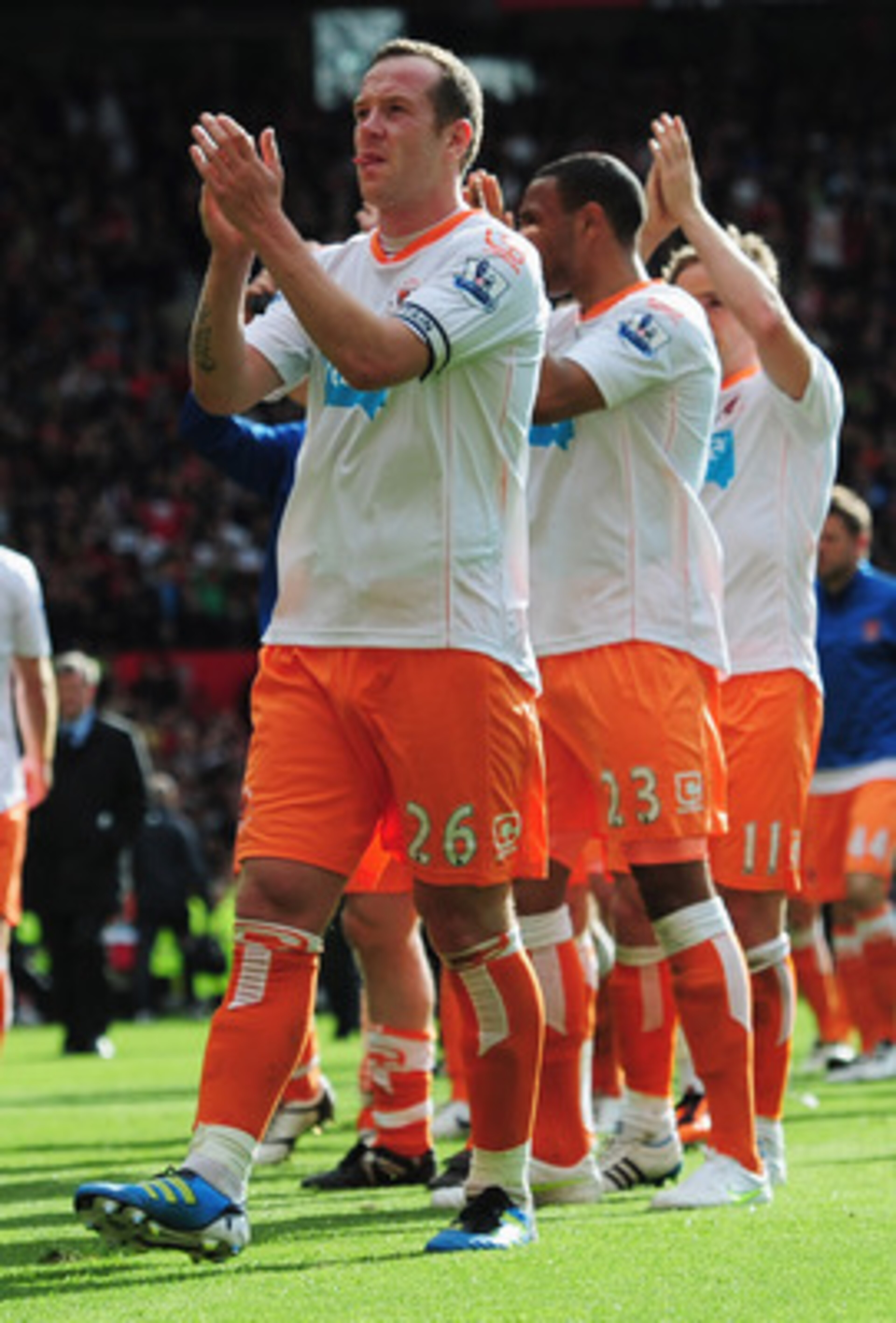 MANCHESTER, ENGLAND - MAY 22: A dejected Charlie Adam of Blackpool applauds the fans as Blackpool are relegated after the Barclays Premier League match between Manchester United and Blackpool at Old Trafford on May 22, 2011 in Manchester, England. (Phot MANCHESTER, ENGLAND - MAY 22: A dejected Charlie Adam of Blackpool applauds the fans as Blackpool are relegated after the Barclays Premier League match between Manchester United and Blackpool at Old Trafford on May 22, 2011 in Manchester, England. (Phot