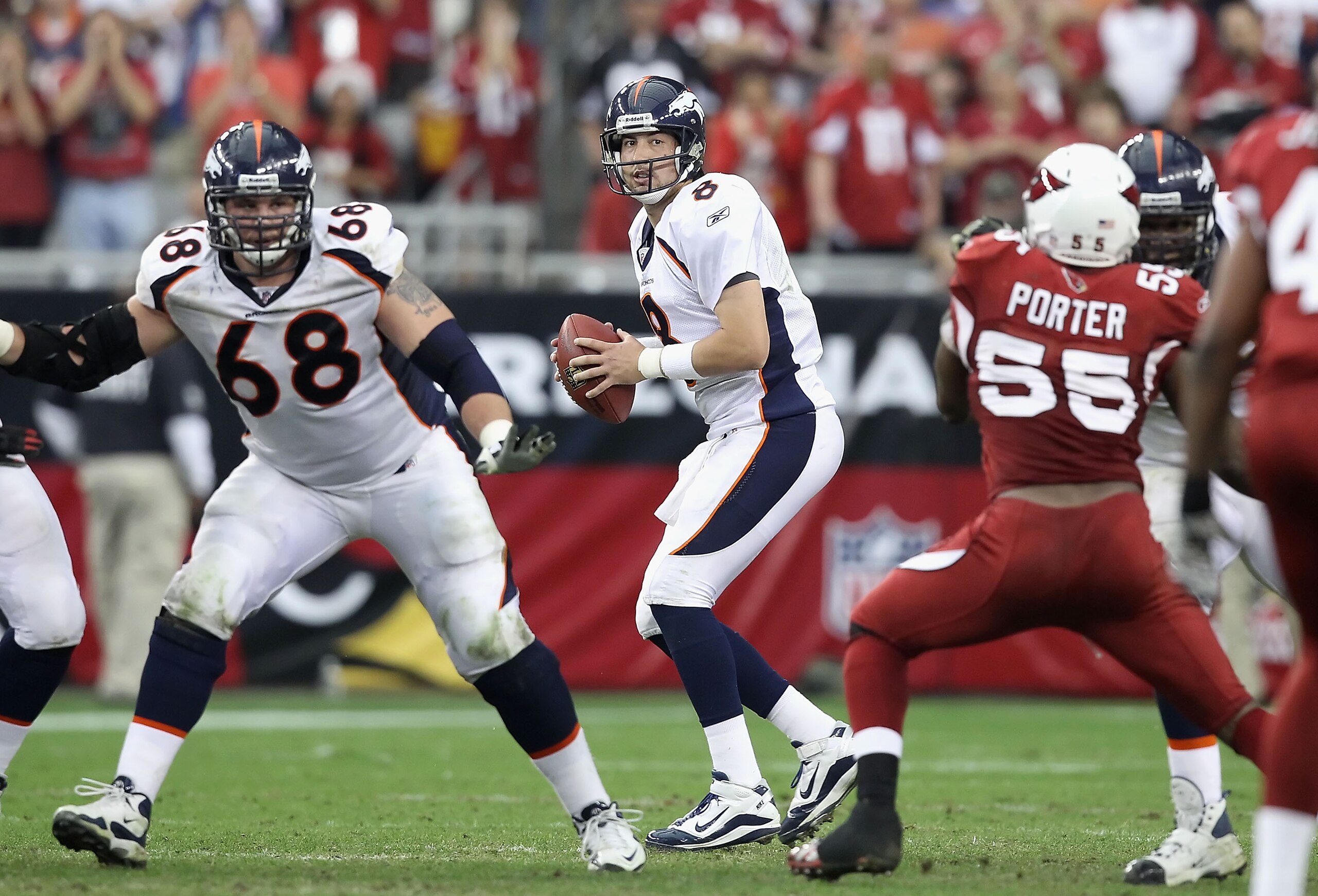 GLENDALE, AZ - DECEMBER 12:  Quarterback Kyle Orton #8 of the Denver Broncos drops back to pass during the NFL game against the Arizona Cardinals at the University of Phoenix Stadium on December 12, 2010 in Glendale, Arizona.  The Cardinals defeated the B