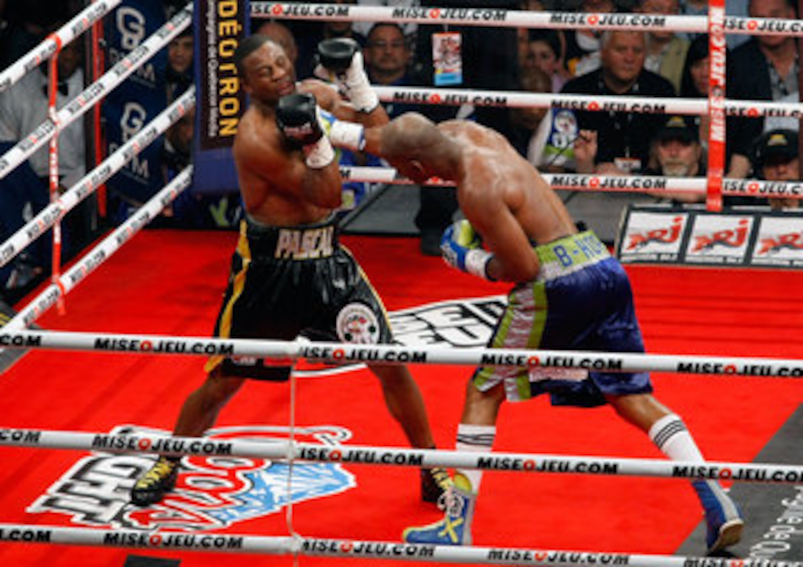 MONTREAL, CANADA - MAY 21:  Bernard Hopkins connects a punch to the chin of Jean Pascal during the WBC Light-Heavyweight Championship fight between Bernard Hopkins and Jean Pascal at the Bell Centre on May 22, 2011 in Montreal, Quebec, Canada.  (Photo by