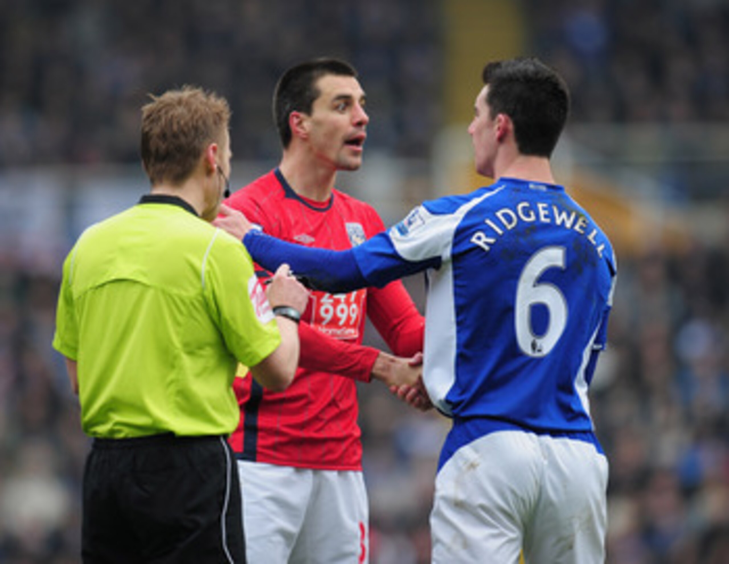 BIRMINGHAM, ENGLAND - MARCH 05:  Paul Scharner of West Bromich Albion and Liam Ridgewell of Birmingham City shake hands during the Barclays Premier League match between Birmingham City and West Bromwich Albion  on March 5, 2011 in Birmingham, England.  (P
