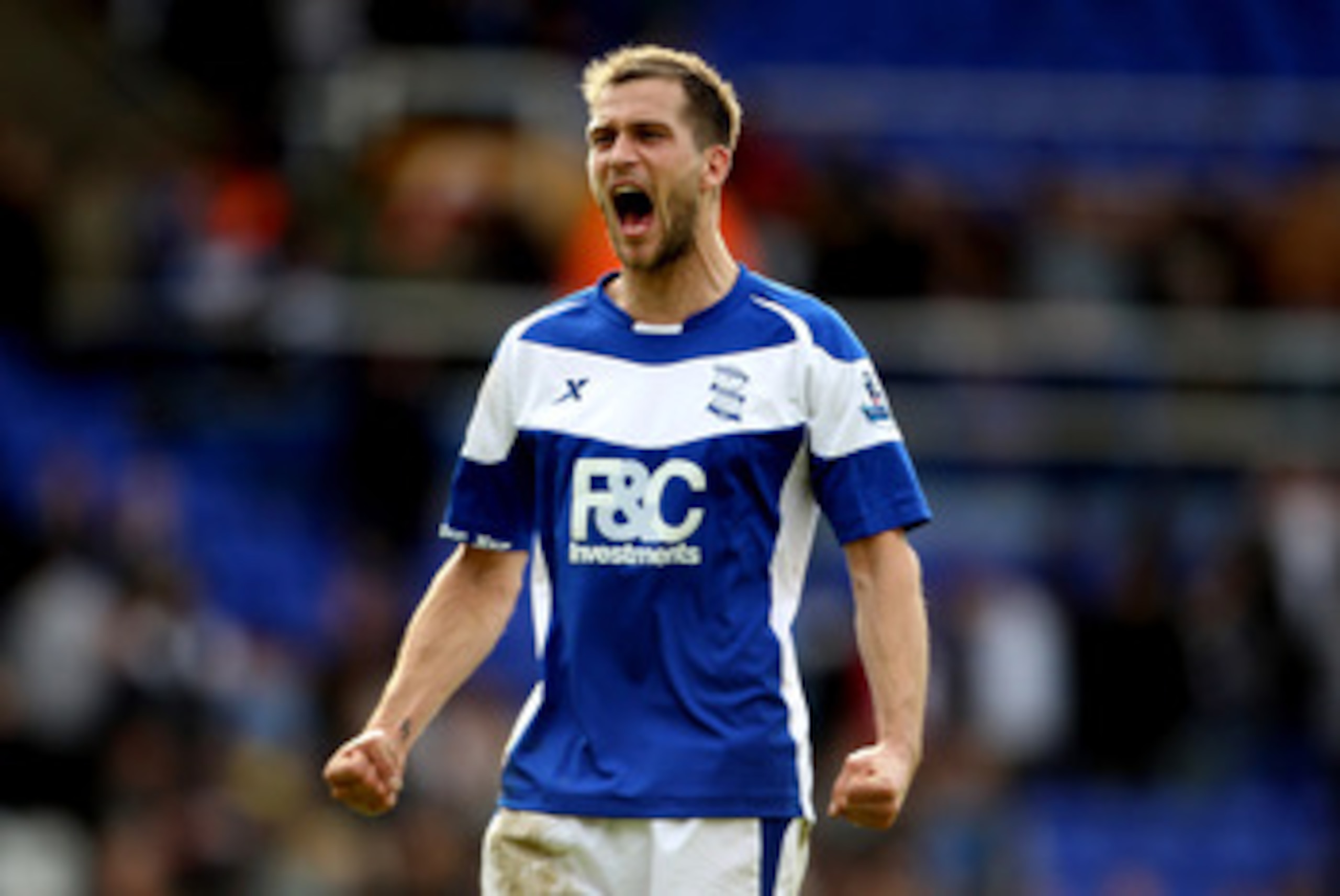 BIRMINGHAM, ENGLAND - APRIL 02:  Roger Johnson of Birmingham celebrates after the victory during the Barclays Premier League match between Birmingham City and Bolton Wanderers at St.Andrews, on April 2, 2011 in Birmingham, England.  (Photo by Scott Heavey