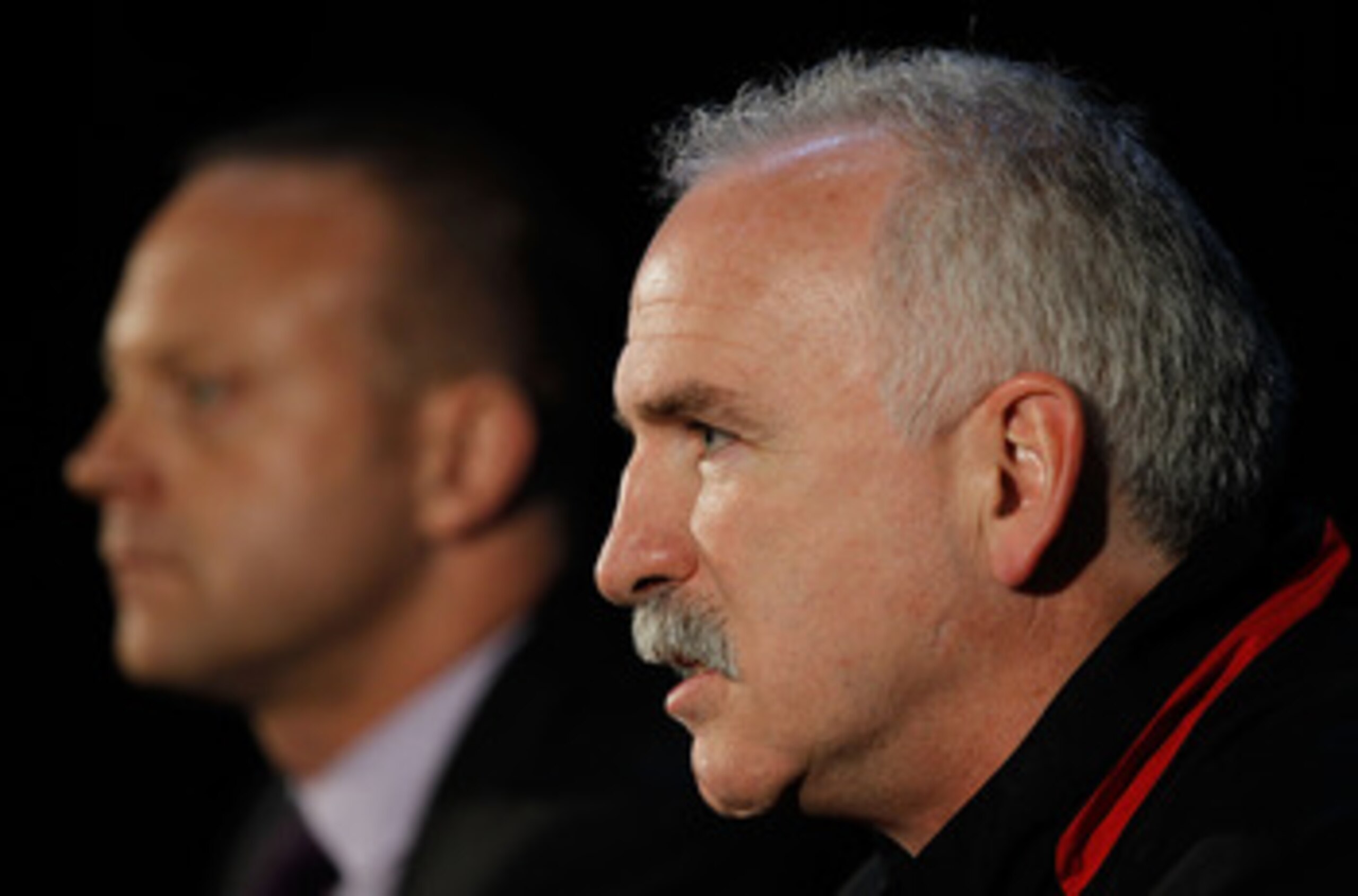 CHICAGO - MAY 27: Head coach Joel Quenneville of the Chicago Blackhawks (R) and General Manager Stan Bowman meet the press during Stanley Cup media day at the United Center on May 27, 2010 in Chicago, Illinois. (Photo by Jonathan Daniel/Getty Images)