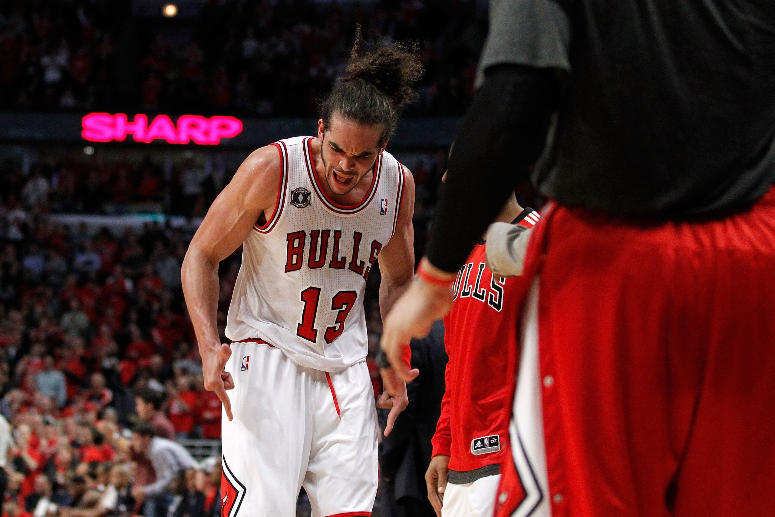 CHICAGO, IL - MAY 15:  Joakim Noah #13 of the Chicago Bulls reacts as he walks back towards the bench against the Miami Heat in Game One of the Eastern Conference Finals during the 2011 NBA Playoffs on May 15, 2011 at the United Center in Chicago, Illinoi