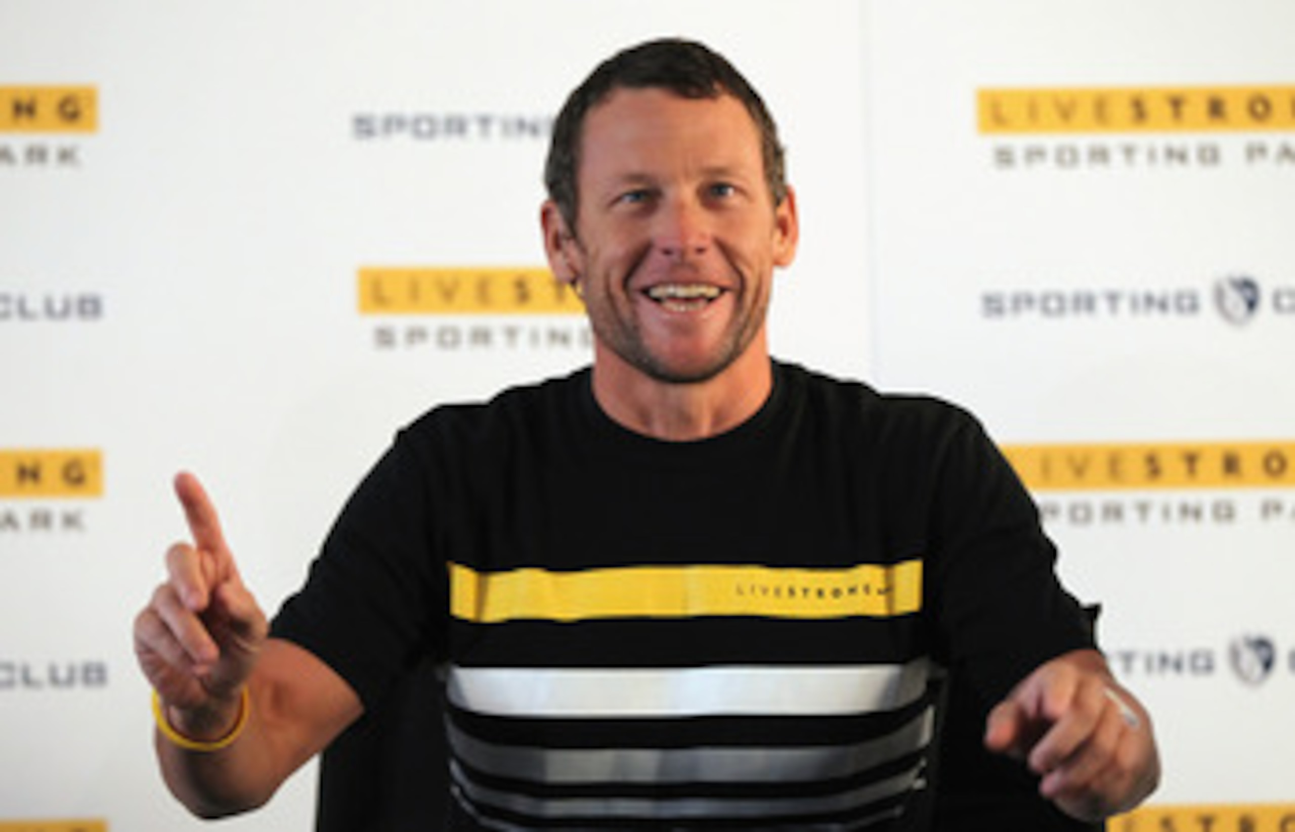 KANSAS CITY, KS - MARCH 08: Champion cyclist, cancer survivor, and Livestrong founder Lance Armstrong addresses the media during a press conference to announce the naming rights of a new stadium to be called Livestrong Sporting Park to host Sporting Kans KANSAS CITY, KS - MARCH 08: Champion cyclist, cancer survivor, and Livestrong founder Lance Armstrong addresses the media during a press conference to announce the naming rights of a new stadium to be called Livestrong Sporting Park to host Sporting Kans