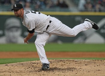 CHICAGO, IL - MAY 17: Starting pitcher John Danks #50 of the Chicago White Sox follows through after throwing a pitch against the Texas Rangers at U.S. Cellular Field on May 17, 2011 in Chicago, Illinois.  The White Sox defeated the Rangers 4-3. (Photo by