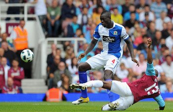 LONDON, ENGLAND - MAY 07:  Luis Boa Morte of West Ham United tackles Christopher Samba of Blackburn Rovers during the Barclays Premier League match between West Ham United and Blackburn Rovers at the Boleyn Ground on May 7, 2011 in London, England.  (Phot