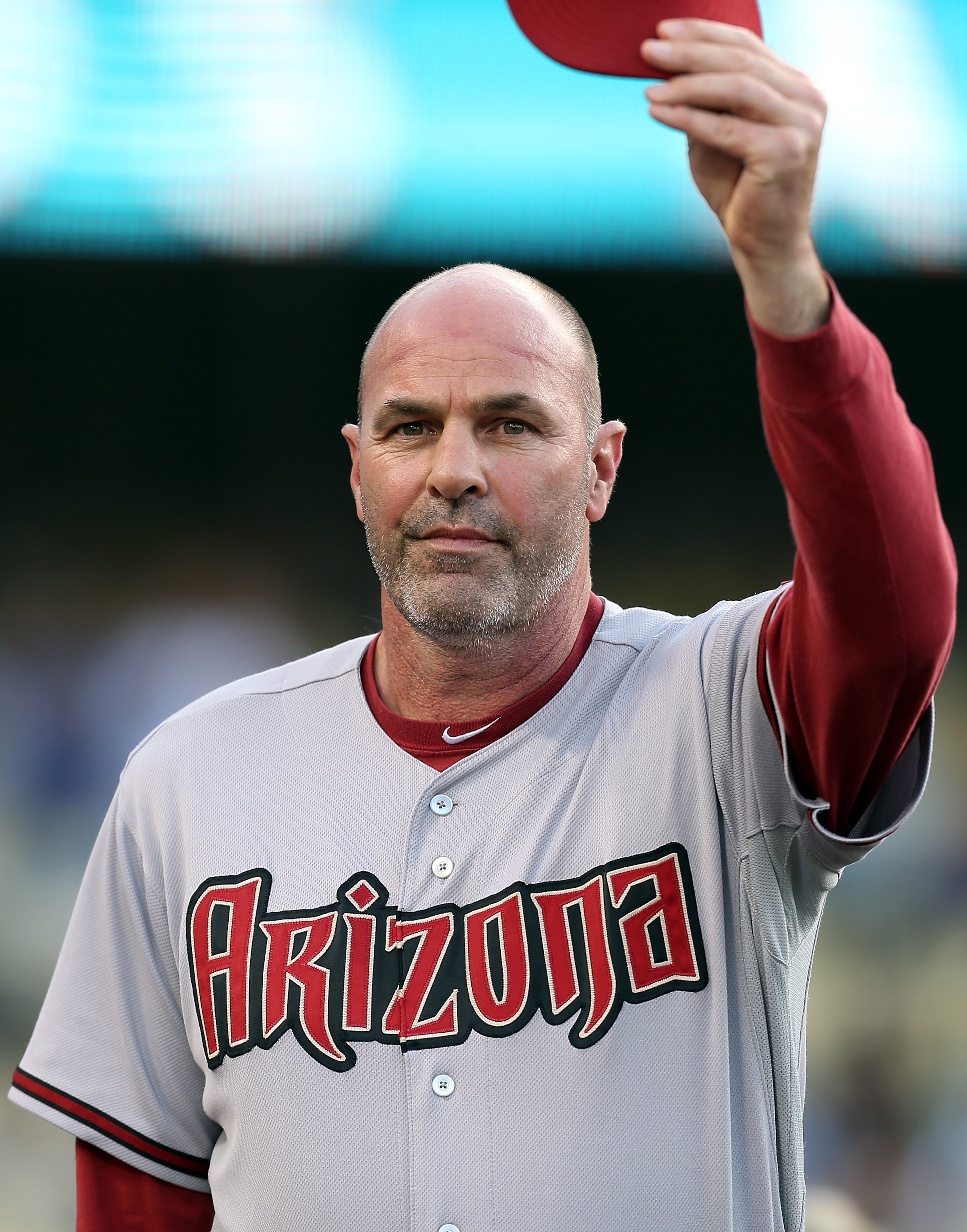 LOS ANGELES - JULY 31: Arizona Diamondbacks manager Kirk Gibson salutes the crowd before a game against the Los Angeles Dodgers on Kirk Gibson Bobblehead Night at Dodger Stadium on July 31, 2012 in Los Angeles, California. (Photo by Josh Hedges/Getty Ima LOS ANGELES - JULY 31: Arizona Diamondbacks manager Kirk Gibson salutes the crowd before a game against the Los Angeles Dodgers on Kirk Gibson Bobblehead Night at Dodger Stadium on July 31, 2012 in Los Angeles, California. (Photo by Josh Hedges/Getty Ima