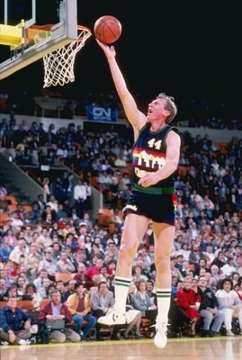 1985:  Dan Issel of the Denver Nuggets lays the ball up during the Nuggets match against the Los Angeles Lakers at the Great Western Forum in Inglewood, California. Mandatory Credit: Rick Stewart  /Allsport