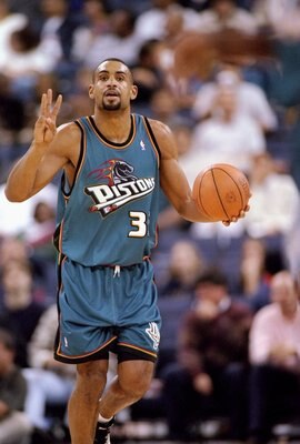 12 Nov 1997: Forward Grant Hill of the Detroit Pistons dribbles the ball down the court during a game against the Golden State Warriors at the Oakland Coliseum in Oakland, California. The Pistons won the game 102-71.