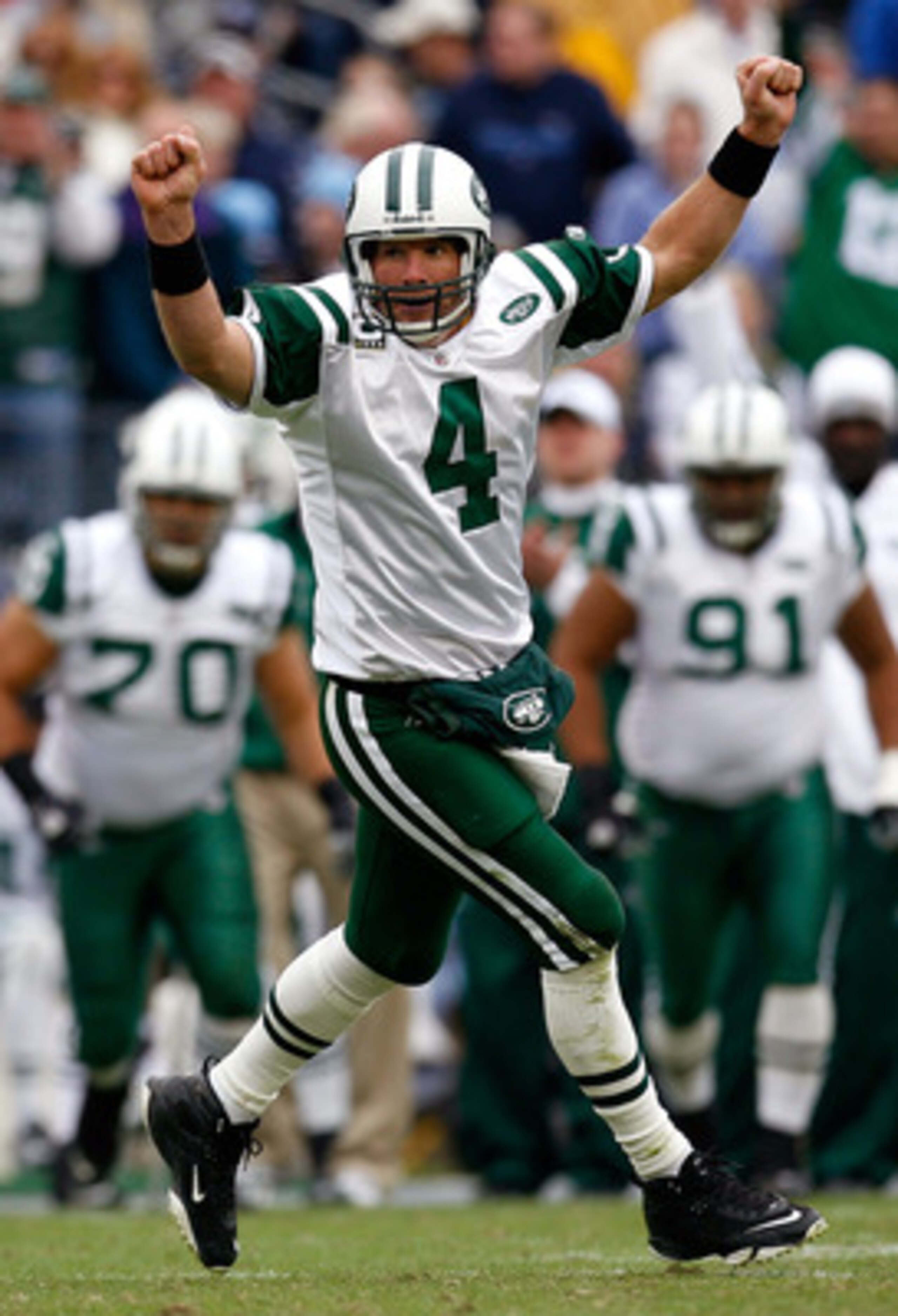 NASHVILLE, TN - NOVEMBER 23:  Quarterback Brett Favre #4 of the New York Jets celebrates passing for a touchdown against the Tennessee Titans during the game at LP Field on November 23, 2008 in Nashville, Tennessee.  (Photo by Kevin C. Cox/Getty Images)