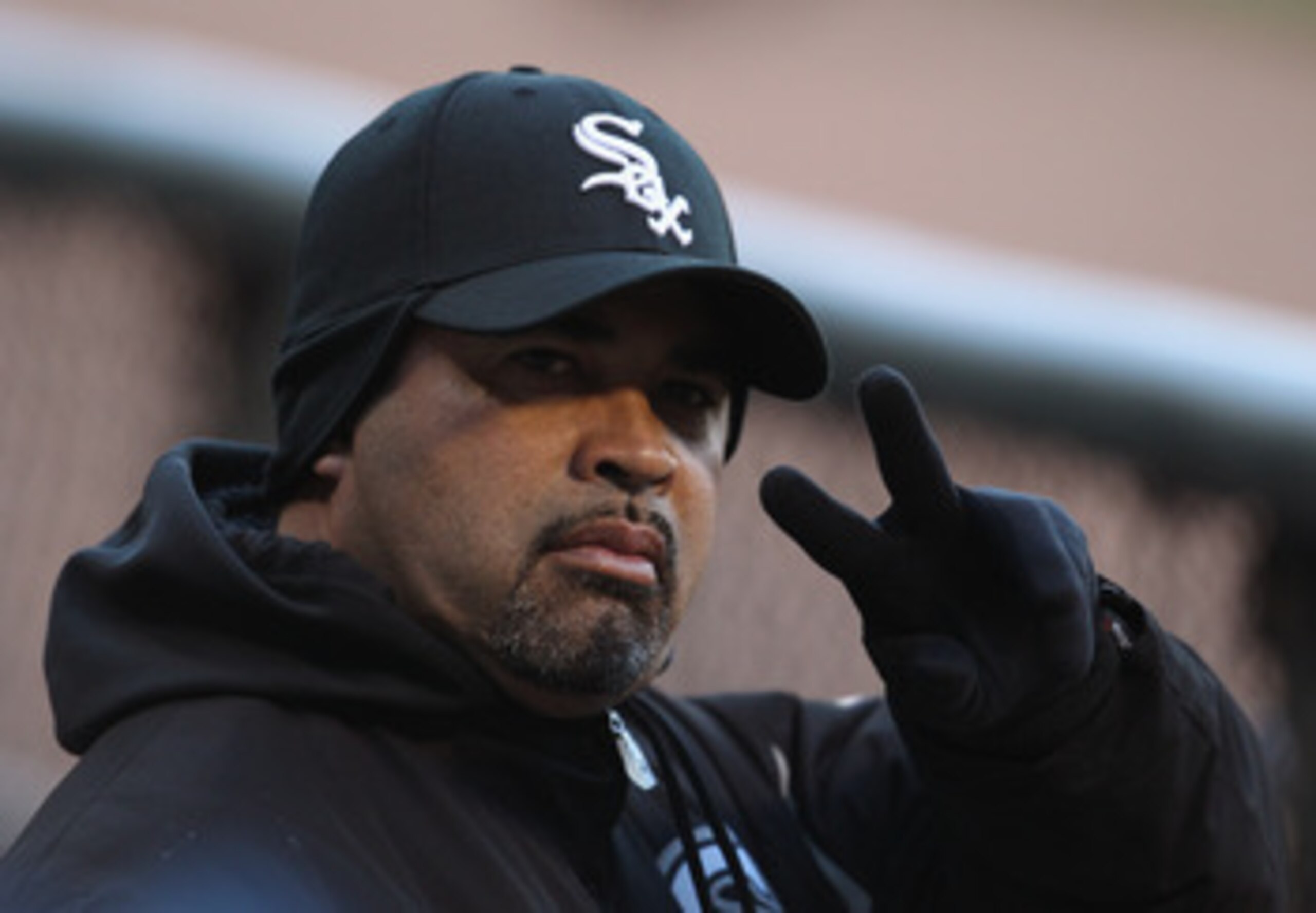 CHICAGO, IL - MAY 16: Manager Ozzie Guillen #13 of the Chicago White Sox waves to fans before a game against the Texas Rangers at U.S. Cellular Field on May 16, 2011 in Chicago, Illinois. The Rangers defeated the White Sox 4-0. (Photo by Jonathan Daniel/G