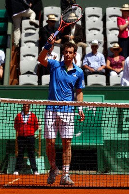 PARIS, FRANCE - MAY 24:  Andy Murray of Great Britain celebrates match point during the men's singles round one match between Andy Murray of Great Britain and Eric Prodon of France on day three of the French Open at Roland Garros on May 24, 2011 in Paris,