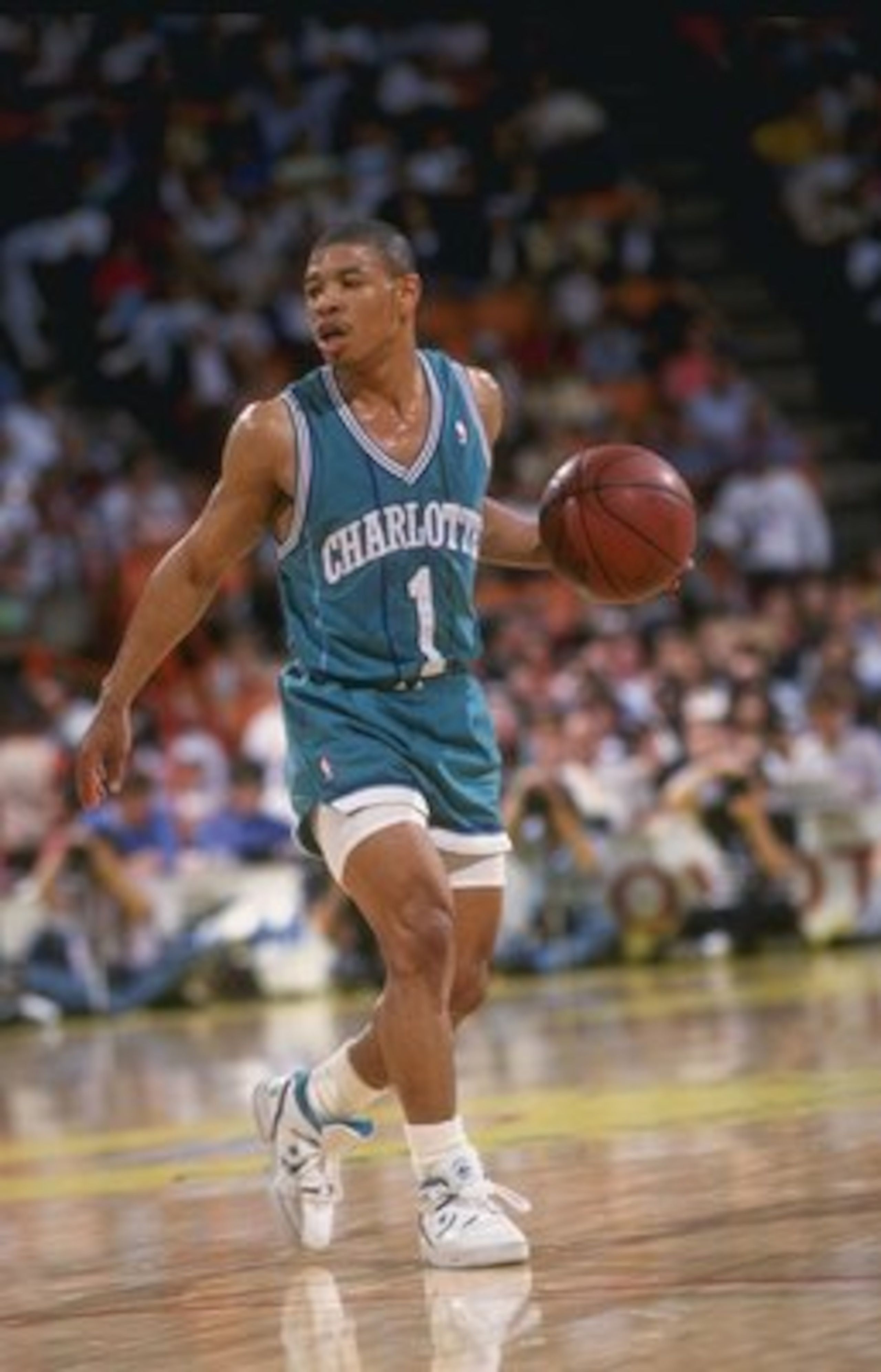 1989-1990:  Guard Tyrone (Muggsy) Bogues of the Charlotte Hornets in action with the ball. Mandatory Credit: Stephen Dunn  /Allsport