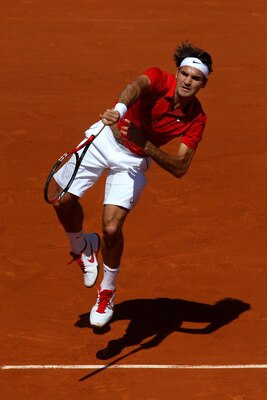 PARIS, FRANCE - MAY 23:  Roger Federer of Switzerland serves during the men's singles first round match between Feliciano Lopez of Spain and Roger Federer of Switzerland on day two of the French Open at Roland Garros on May 23, 2011 in Paris, France.  (Ph