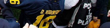 ANN ARBOR, MI - APRIL 16: Denard Robinson #16 of the Michigan Wolverines leads the a cheer at the end of the annual Spring Game at Michigan Stadium on April 16, 2011 in Ann Arbor, Michigan.  (Photo by Leon Halip/Getty Images)
