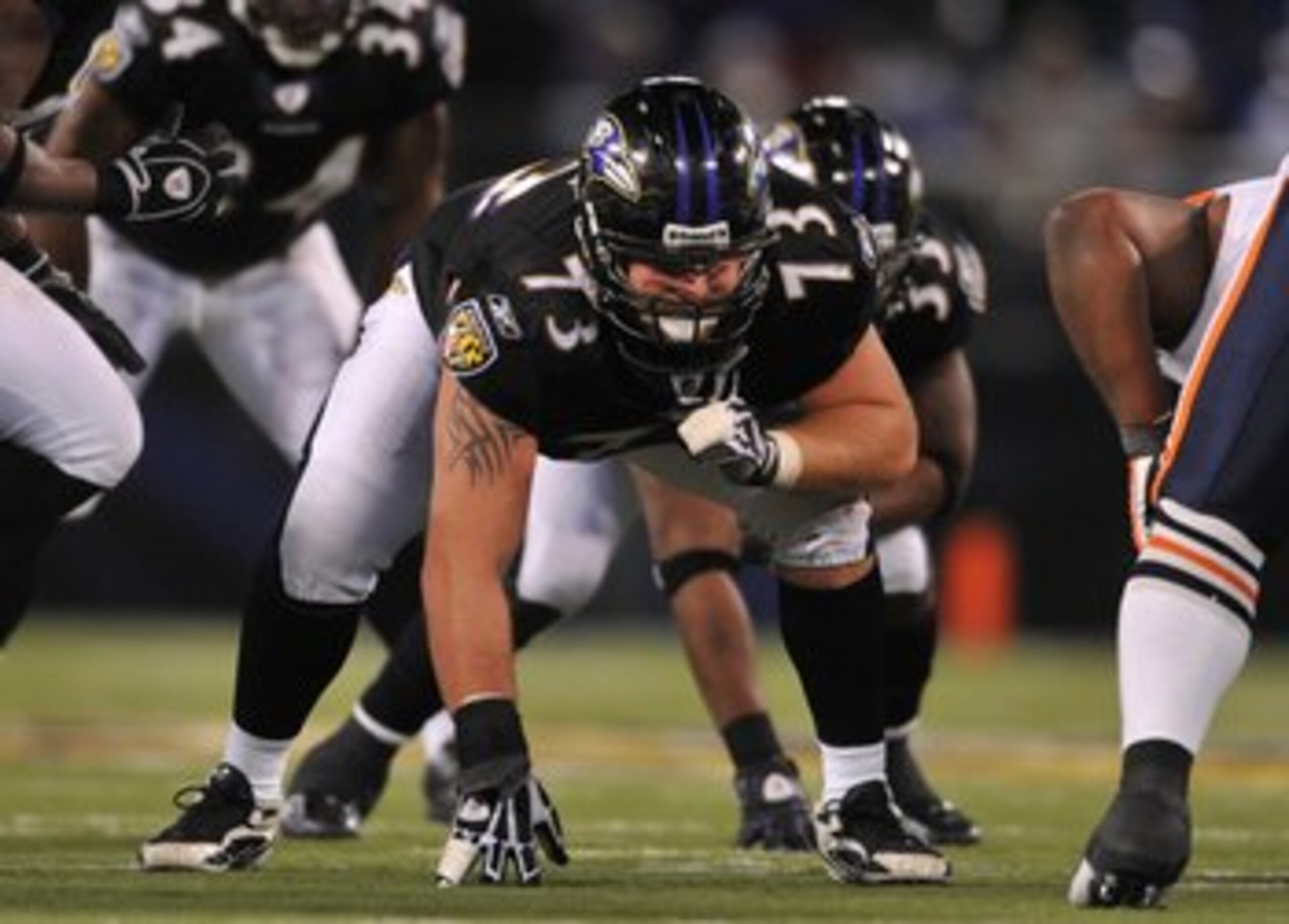 BALTIMORE - DECEMBER 20:  Marshal Yanda #73 of the Baltimore Ravens defends against the Chicago Bears at M&T Bank Stadium on December 20, 2009 in Baltimore, Maryland. The Ravens defeated the Bears 31-7. (Photo by Larry French/Getty Images)