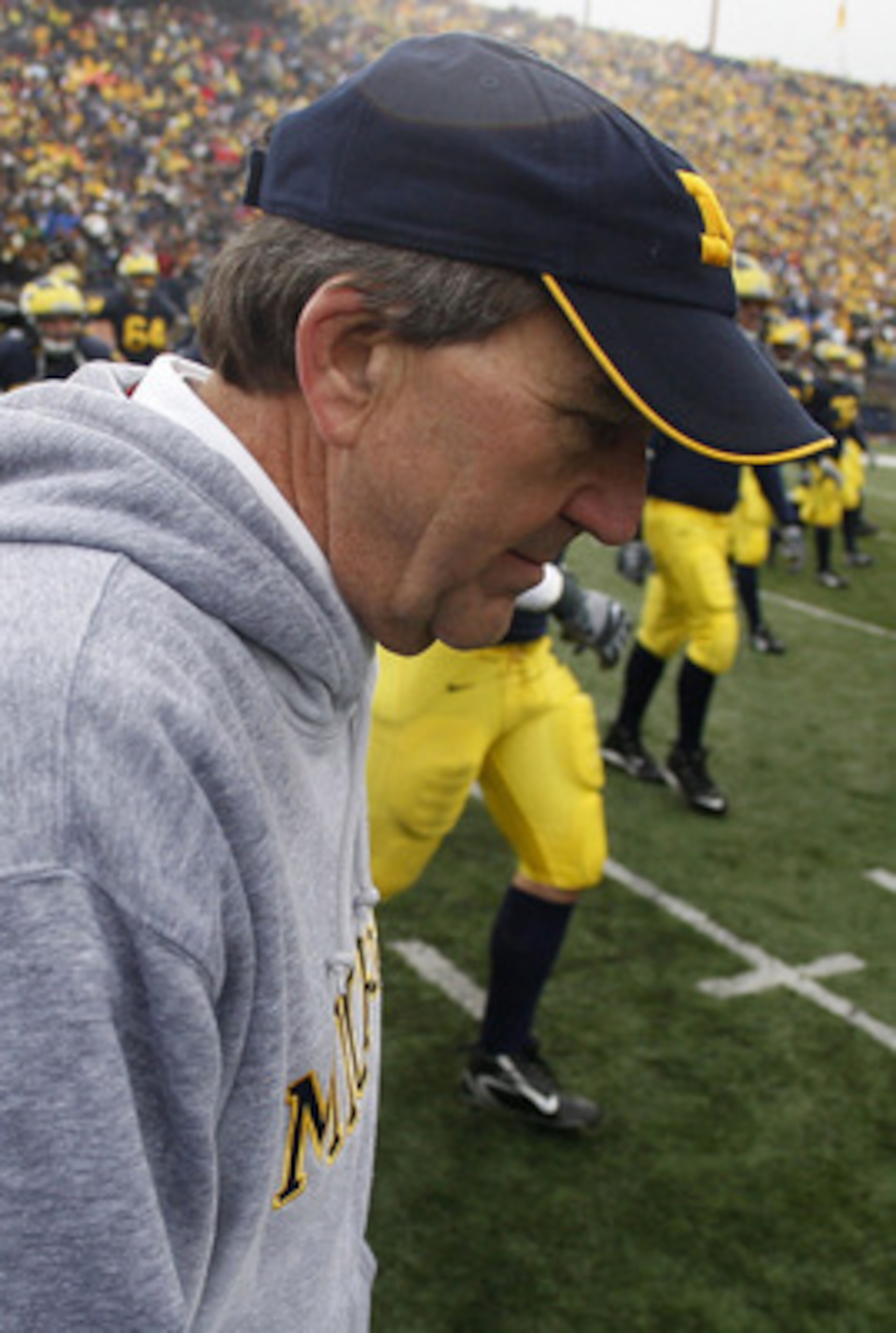 ANN ARBOR, MI - NOVEMBER 17: Head coach Lloyd Carr of the Michigan Wolverines walks of the field after a 14-3 loss to the Ohio State Buckeyes on November 17, 2007 at Michigan Stadium in Ann Arbor, Michigan. (Photo By Gregory Shamus/Getty Images) ANN ARBOR, MI - NOVEMBER 17: Head coach Lloyd Carr of the Michigan Wolverines walks of the field after a 14-3 loss to the Ohio State Buckeyes on November 17, 2007 at Michigan Stadium in Ann Arbor, Michigan. (Photo By Gregory Shamus/Getty Images)