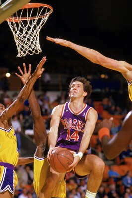 INGLEWOOD, CA - 1988:  Jeff Hornacek #14 of the Phoenix Suns shoots against the Los Angeles Lakers during the game at the Great Western Forum in Inglewood, California. (Photo by Mike Powell/Getty Images)