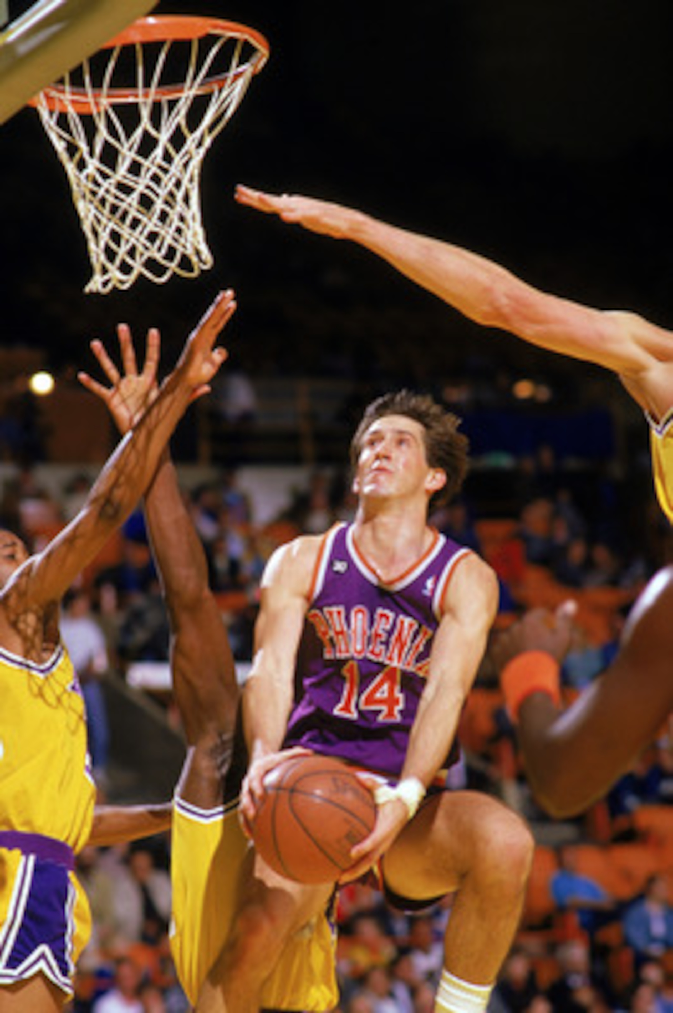 INGLEWOOD, CA - 1988:  Jeff Hornacek #14 of the Phoenix Suns shoots against the Los Angeles Lakers during the game at the Great Western Forum in Inglewood, California. (Photo by Mike Powell/Getty Images)