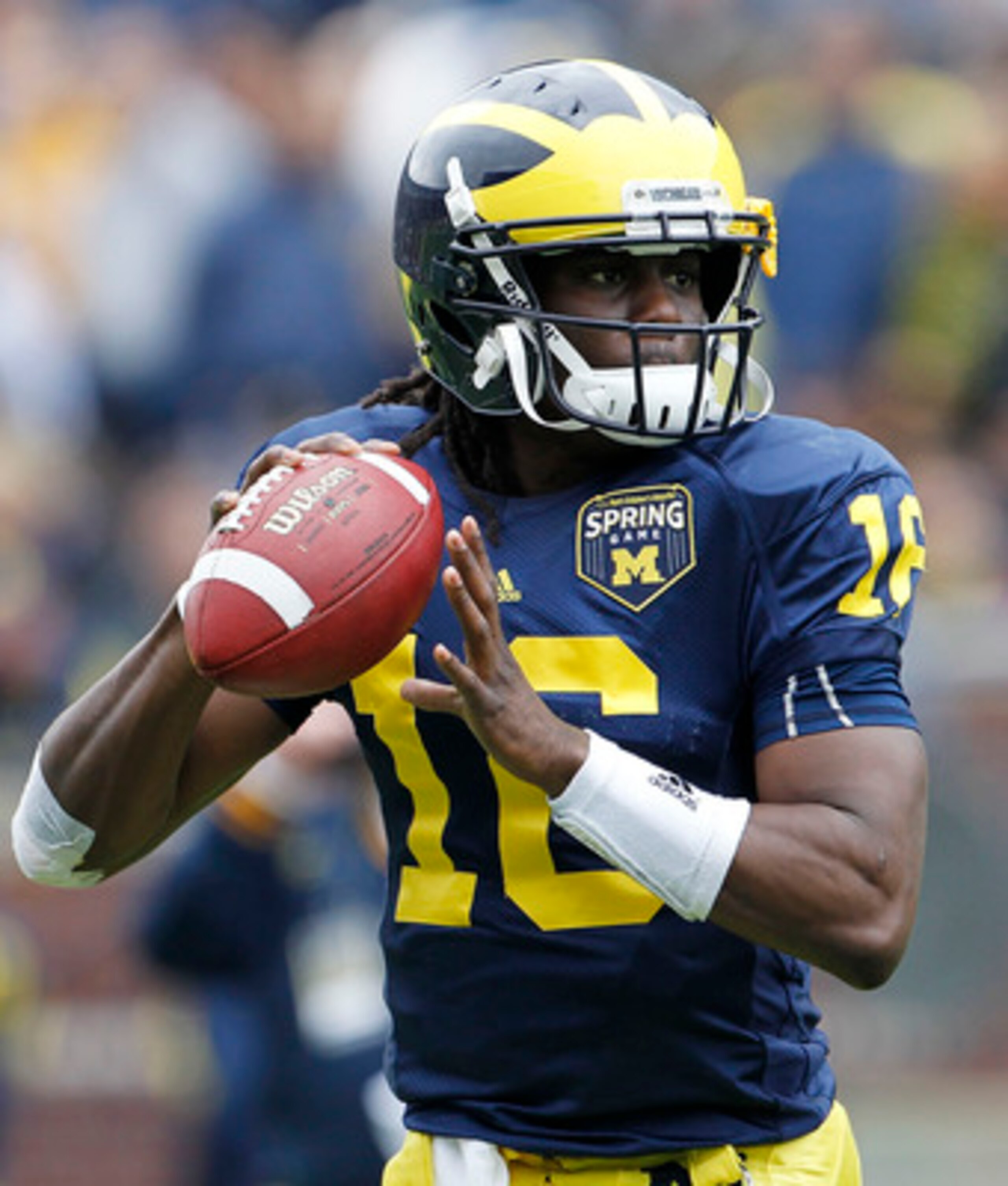 ANN ARBOR, MI - APRIL 16: Denard Robinson #16 of the Michigan Wolverines drops back to pass during the annual Spring Game at Michigan Stadium on April 16, 2011 in Ann Arbor, Michigan. (Photo by Leon Halip/Getty Images) ANN ARBOR, MI - APRIL 16: Denard Robinson #16 of the Michigan Wolverines drops back to pass during the annual Spring Game at Michigan Stadium on April 16, 2011 in Ann Arbor, Michigan. (Photo by Leon Halip/Getty Images)