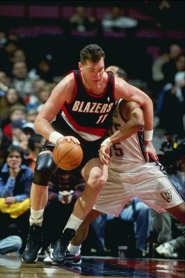 24 Feb 1999:  Arvydas Sabonis #11 of the Portland Trailblazers dribbles the ball during the game against the New Jersey Nets at the Continental Airlines Arena in East Rutherford, New Jersey. The Trailblazers defeated the Nets 94-85.  Mandatory Credit: Al