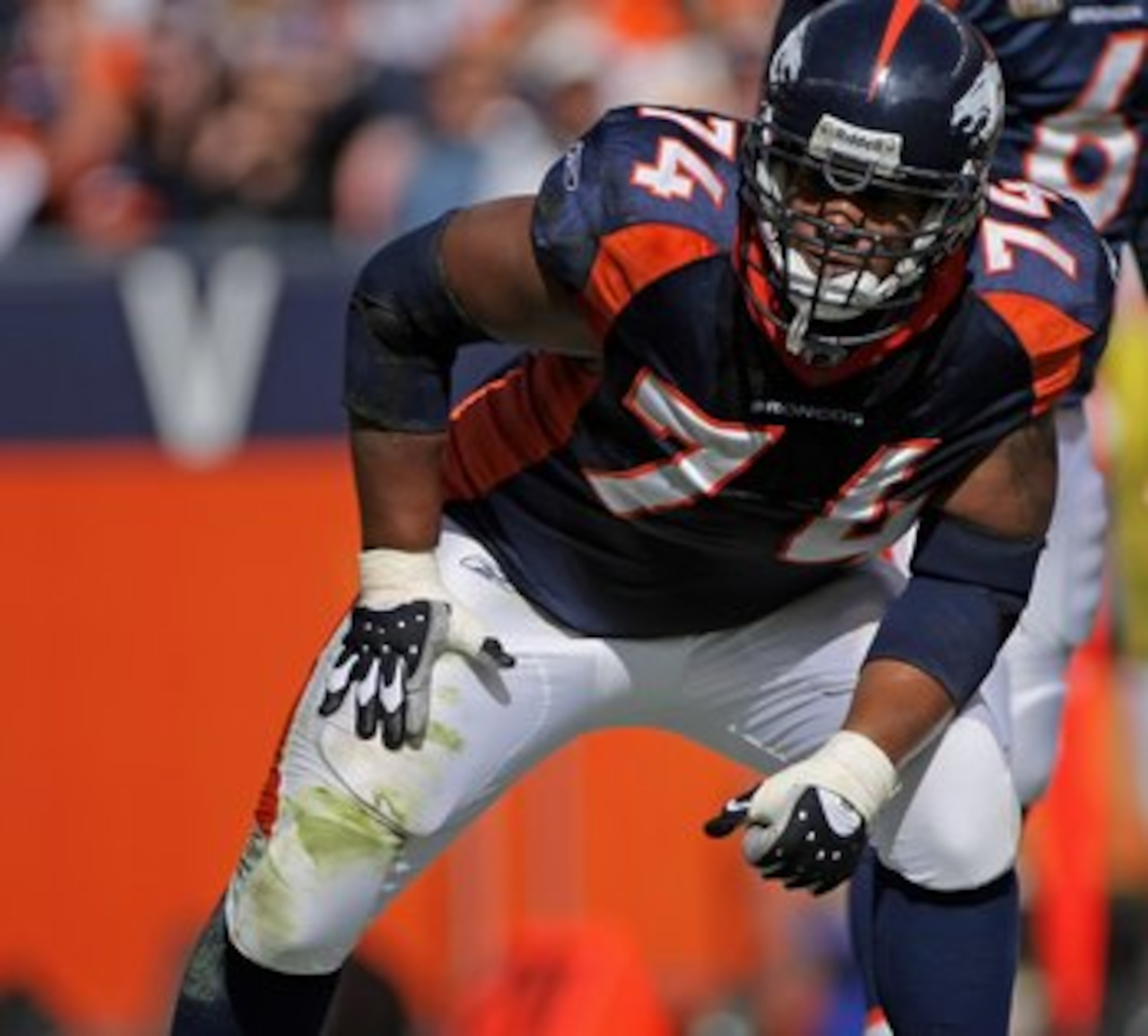 DENVER - OCTOBER 05:  Offensive tackle Ryan Harris #74 of the Denver Broncos lines up against the Tampa Bay Buccaneers during NFL action on October 5, 2008 in Denver, Colorado. The Broncos defeated the Buccaneers 16-13.  (Photo by Doug Pensinger/Getty Ima