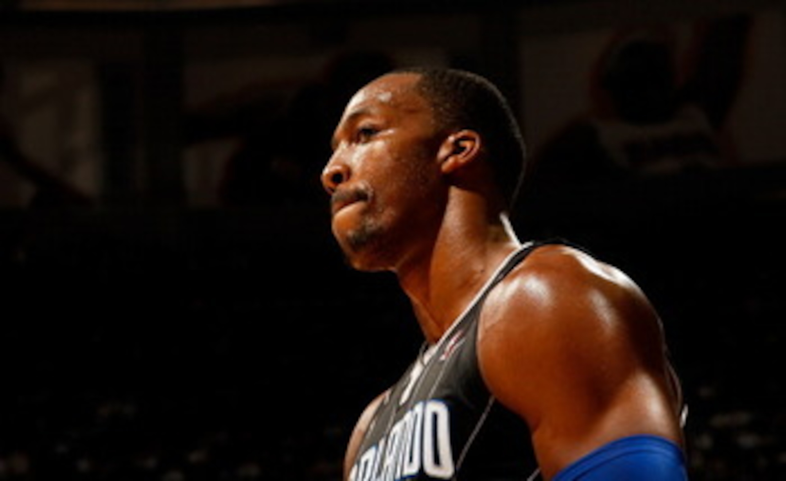 ATLANTA, GA - APRIL 28:  Dwight Howard #12 of the Orlando Magic walks to the bench after a turnover to the Atlanta Hawks during Game Six of the Eastern Conference Quarterfinals in the 2011 NBA Playoffs at Philips Arena on April 28, 2011 in Atlanta, Georgi